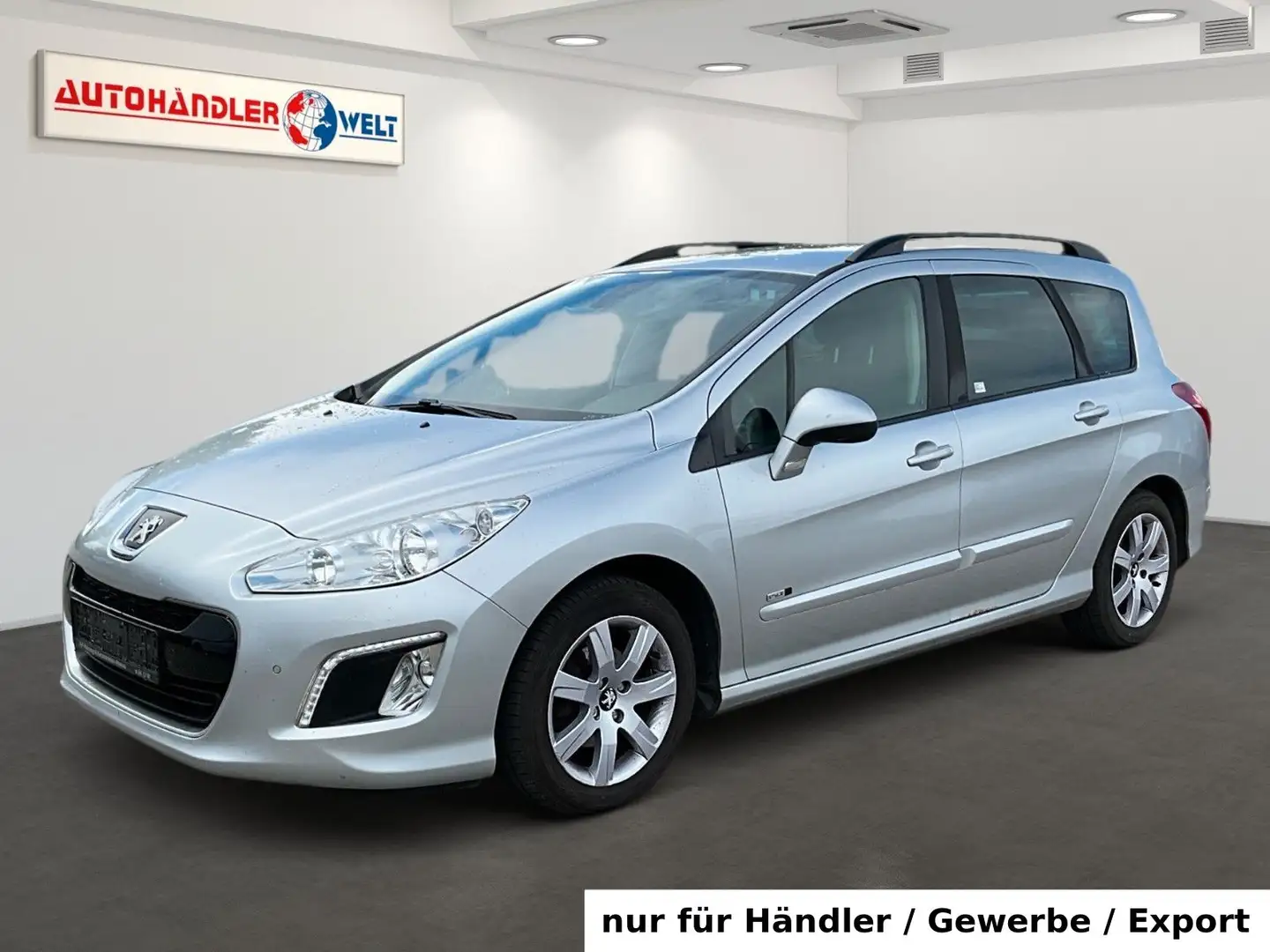 Peugeot 308 Kombi 1.6 eHDi Klimaauto. PDC Navi Grau - 1