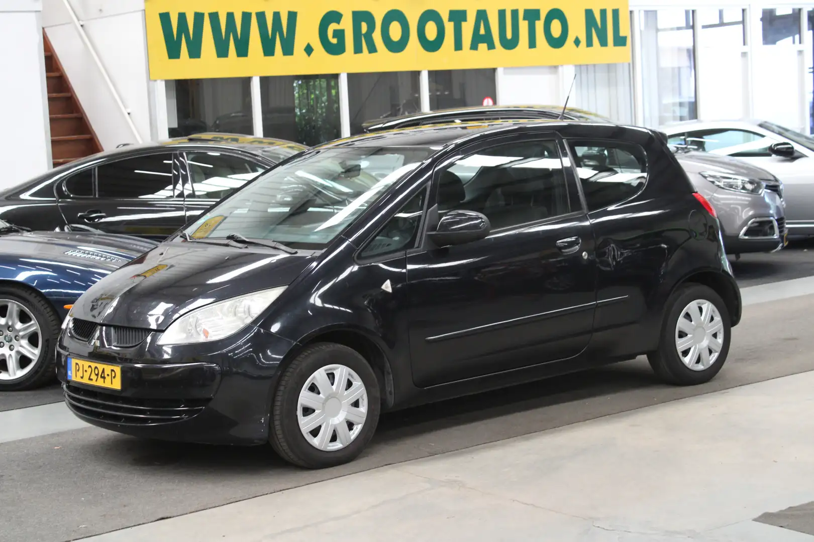 Mitsubishi Colt 1.3 Incharge Airco, Stuurbekrachtiging, Navigatie Schwarz - 1