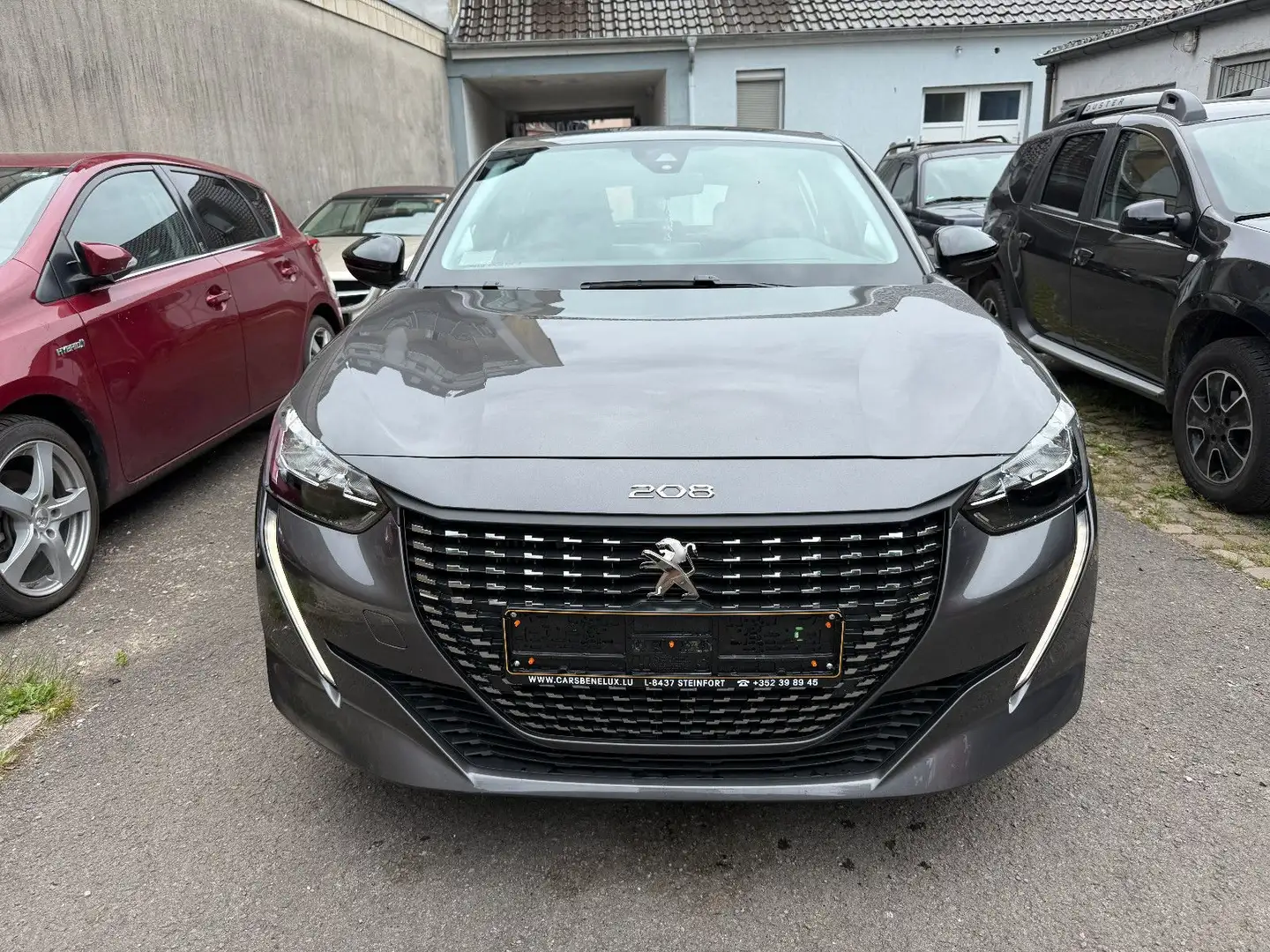Peugeot 208 1.5 BlueHDi Active *Navi/Touch/Bluetooth* Grijs - 2