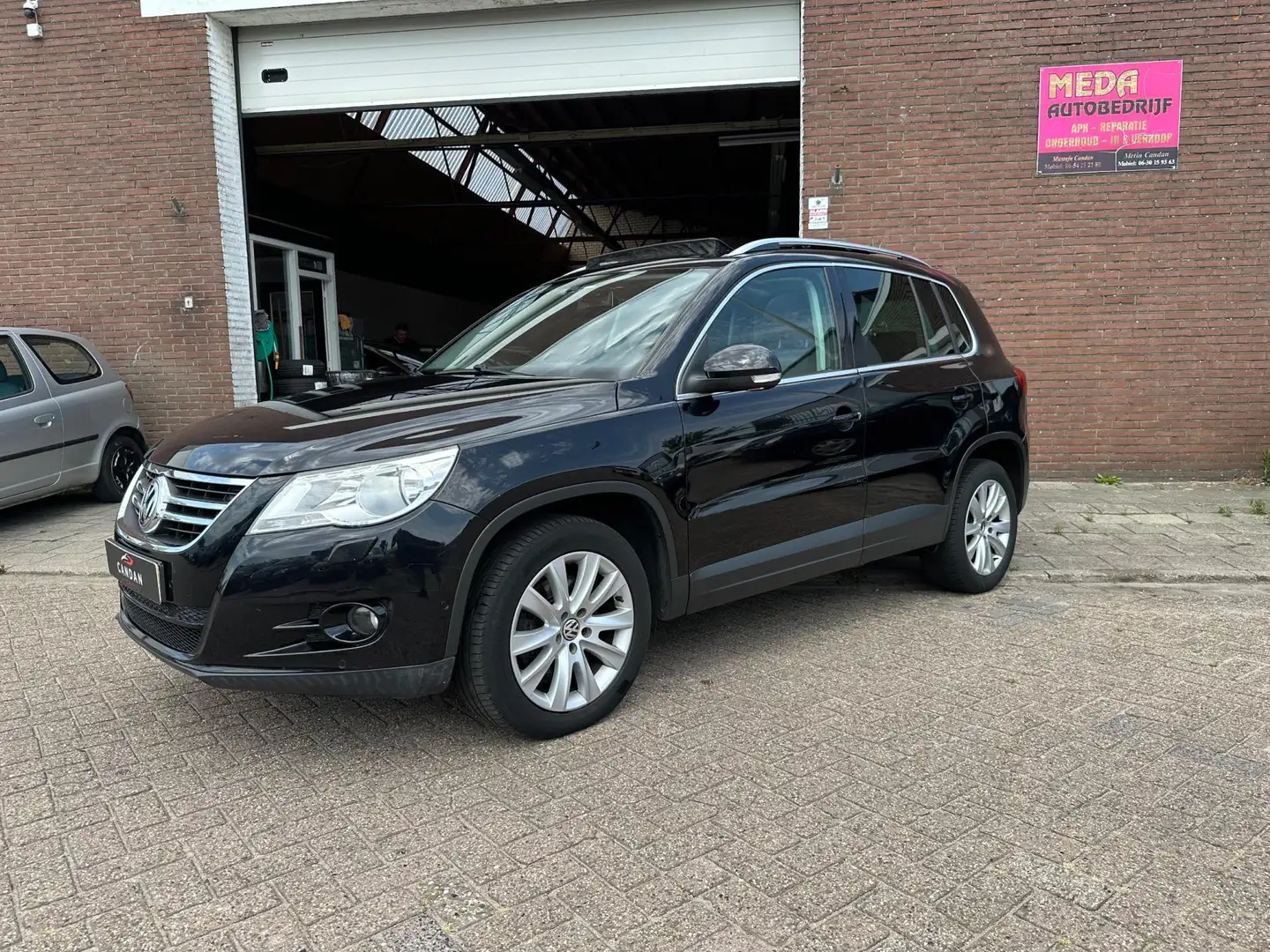Volkswagen Tiguan 1.4 TSI Comfort&Design 4Motion | Airco | Panoramad Zwart - 1
