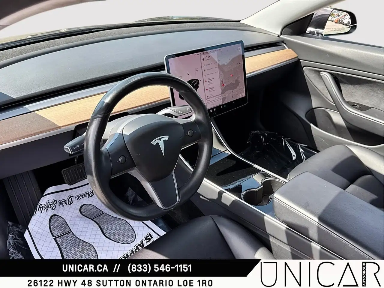 Tesla Model 3 photo Tesla Model 3