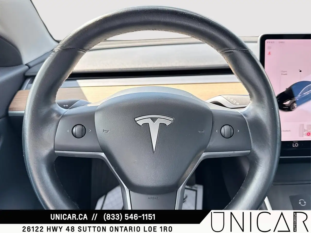Tesla Model 3 photo Tesla Model 3