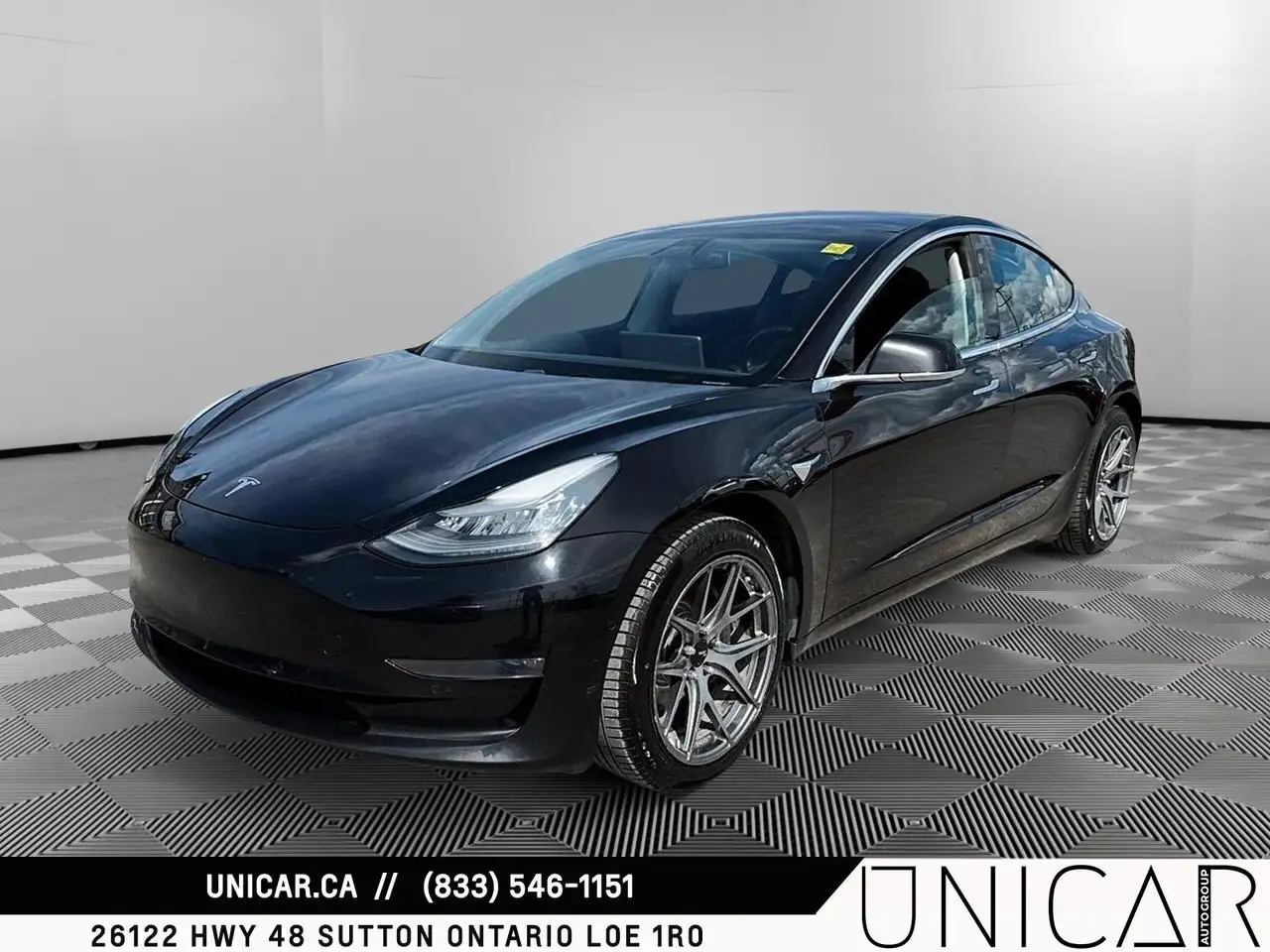 Tesla Model 3 photo Tesla Model 3