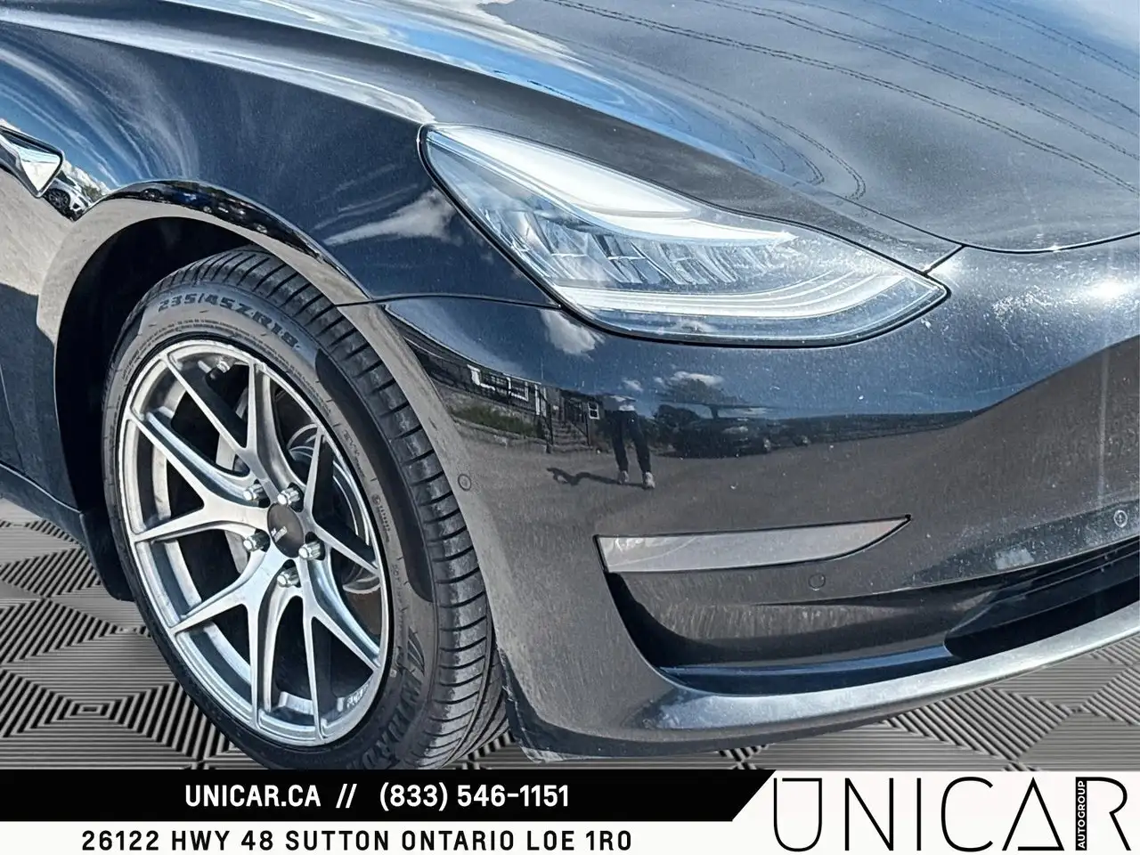 Tesla Model 3 photo Tesla Model 3
