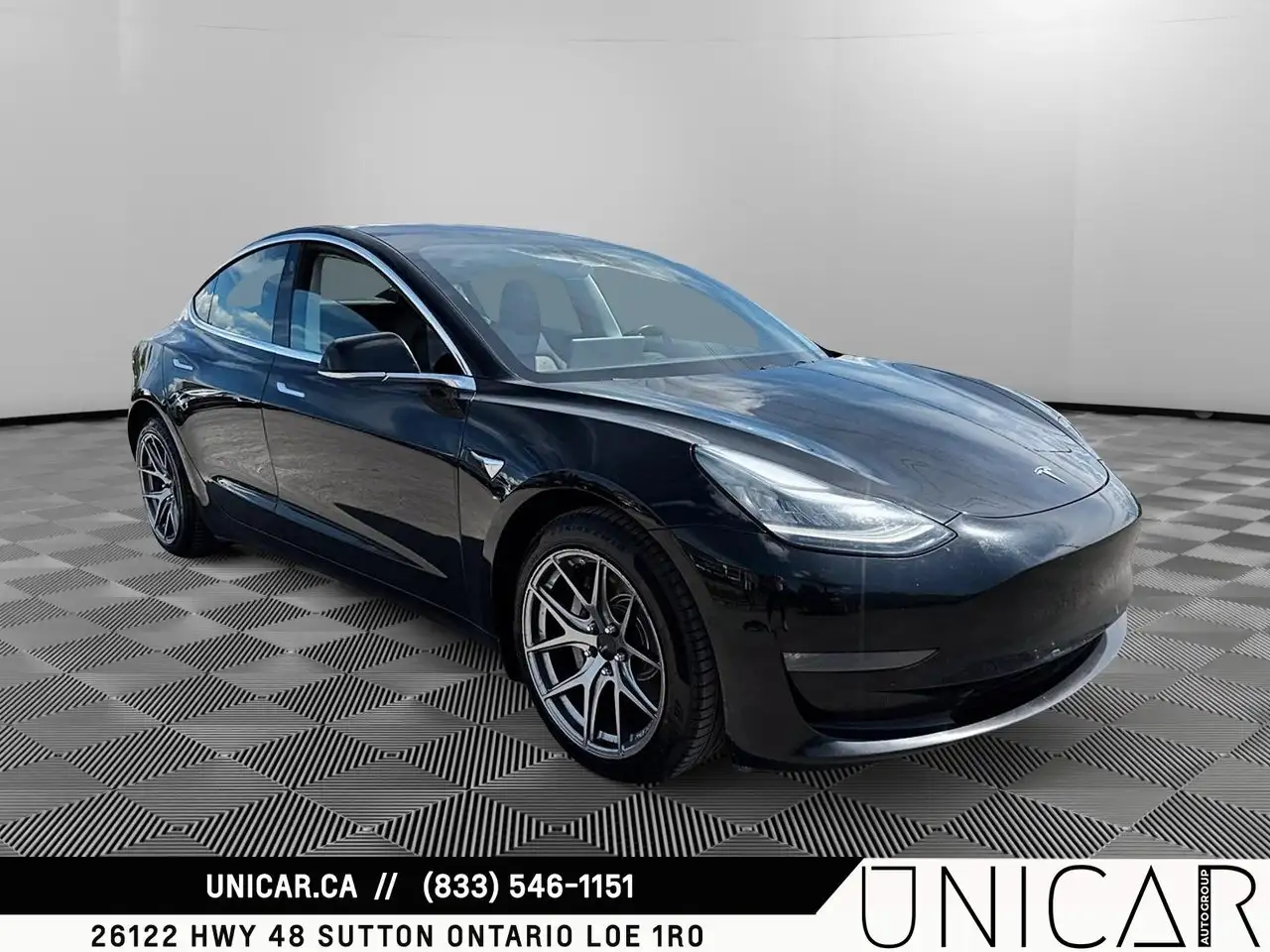 Tesla Model 3 photo Tesla Model 3