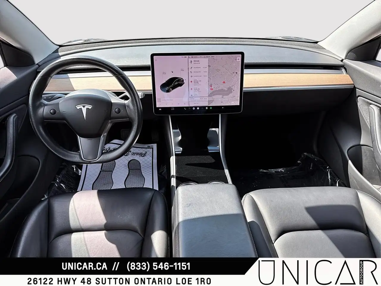 Tesla Model 3 photo Tesla Model 3