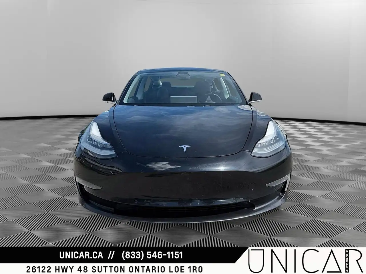 Tesla Model 3 photo Tesla Model 3