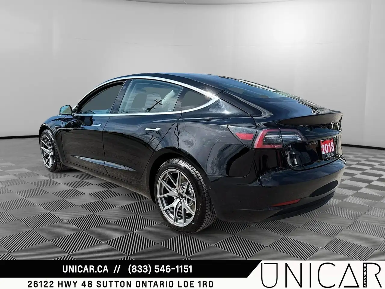 Tesla Model 3 photo Tesla Model 3