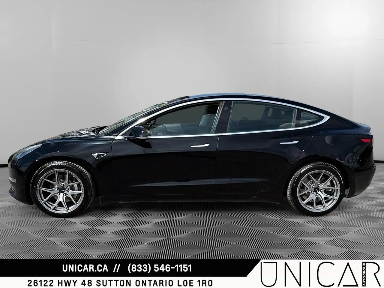 Tesla Model 3 photo Tesla Model 3