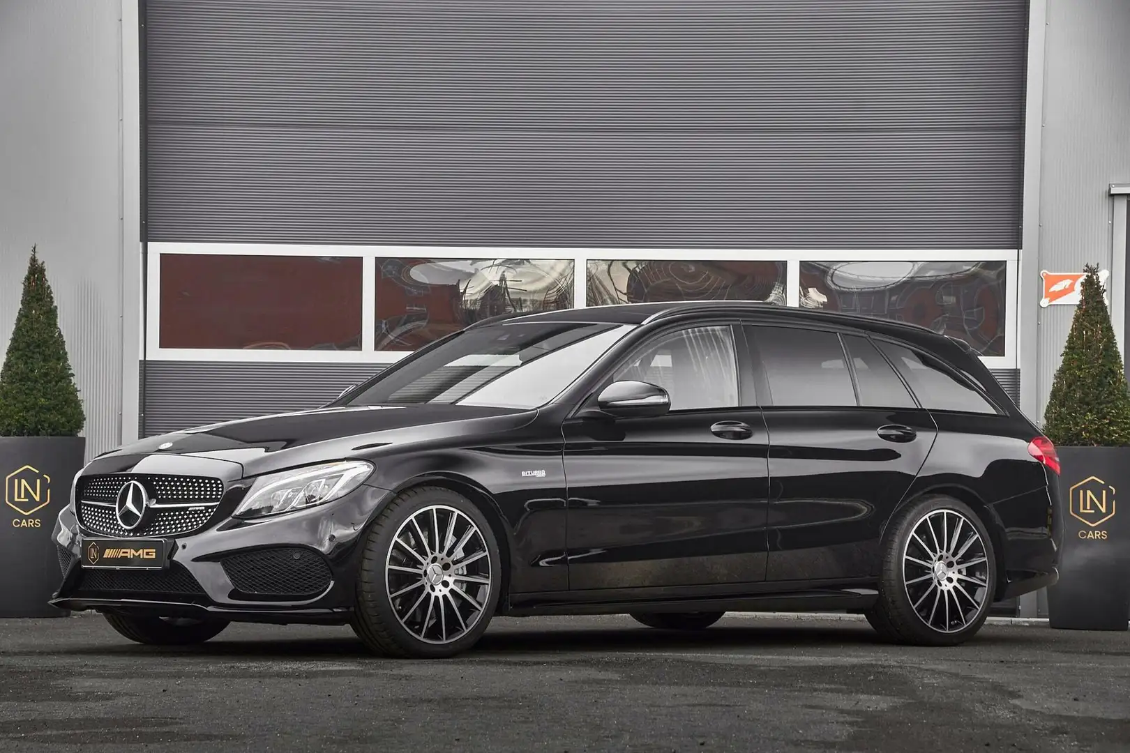 Mercedes-Benz C 43 AMG Estate 4MATIC | Pano | 9-traps Zwart - 1