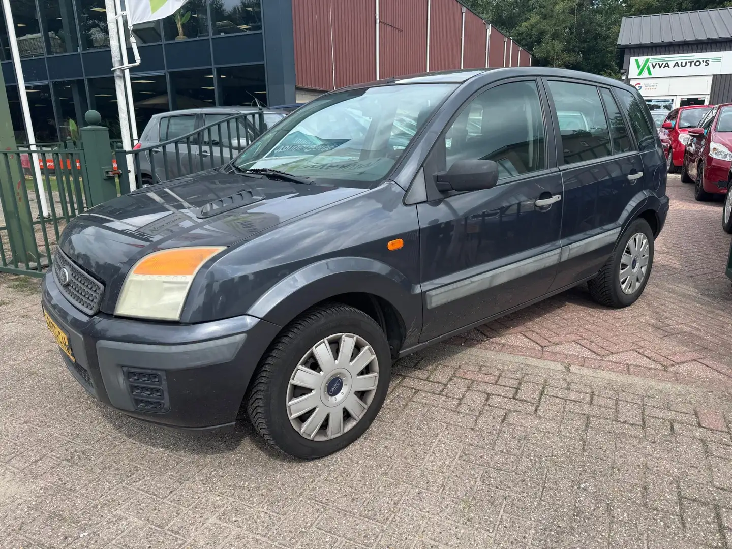 Ford Fusion 1.4 Champion airco,elektr ramen, APK 1-2026 Grijs - 1
