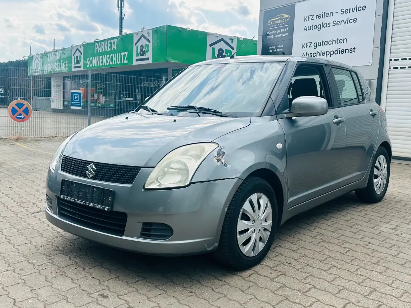 Suzuki Swift Lim. Snow Grau - 1