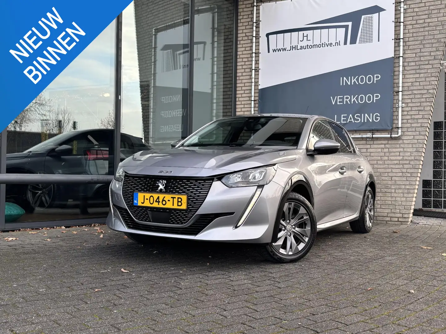 Peugeot e-208 EV Allure 50 kWh*3FASE*CRUISE*ECC*CARPLAY*CAM* Grau - 1
