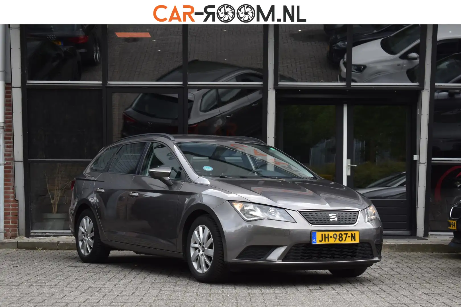 SEAT Leon ST 1.0 EcoTSI Reference Trekhaak Cruise Airco NAP Gris - 1