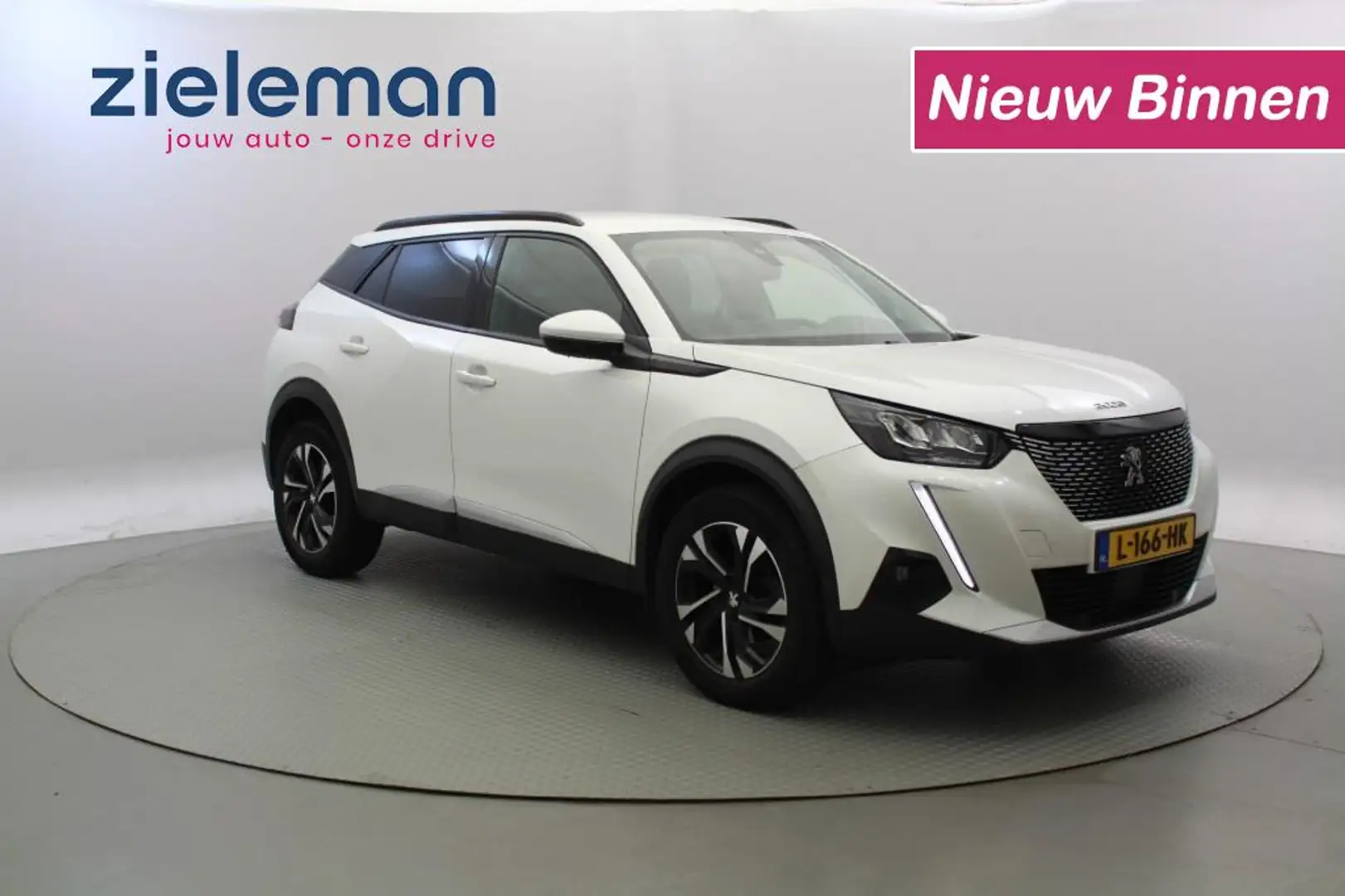 Peugeot 2008 1.2 PureTech Allure - Carplay, Camera, Half Leer Wit - 1