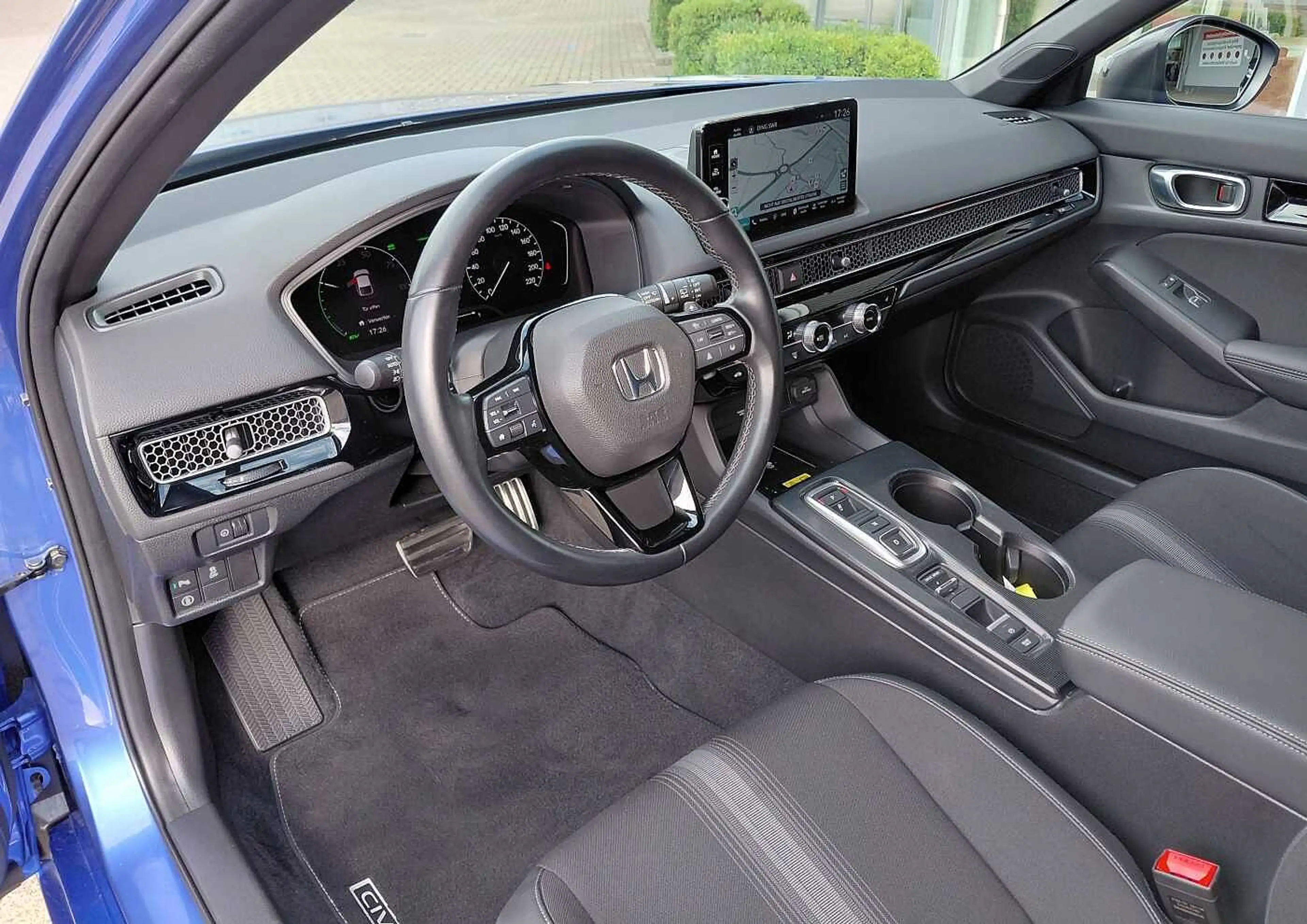 Honda Civic e:HEV 2.0 i-MMD Hybrid Sport — photo 11