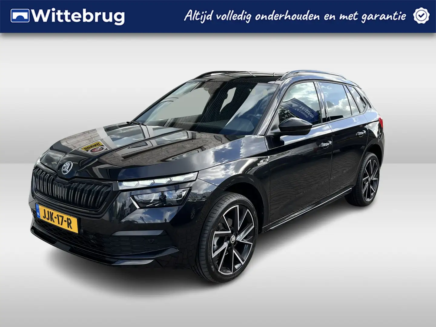 Skoda Kamiq 1.5 TSI Monte Carlo / AUTOMAAT/ ELEKTR. TREKHAAK/ Zwart - 1