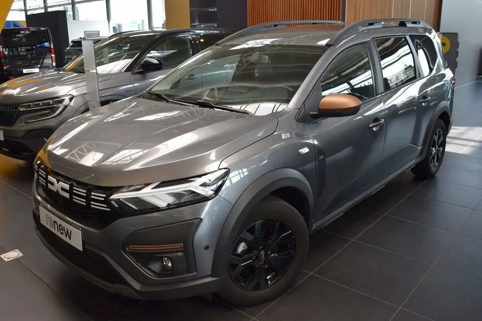 Dacia Jogger HYBRID Extreme AUT 5PL/Valckenier Gent Gris - 1