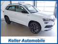 Skoda Karoq 1.5 TSI DSG Sportline el.Heckkl. Kamera Pano Navi Weiß - thumbnail 1