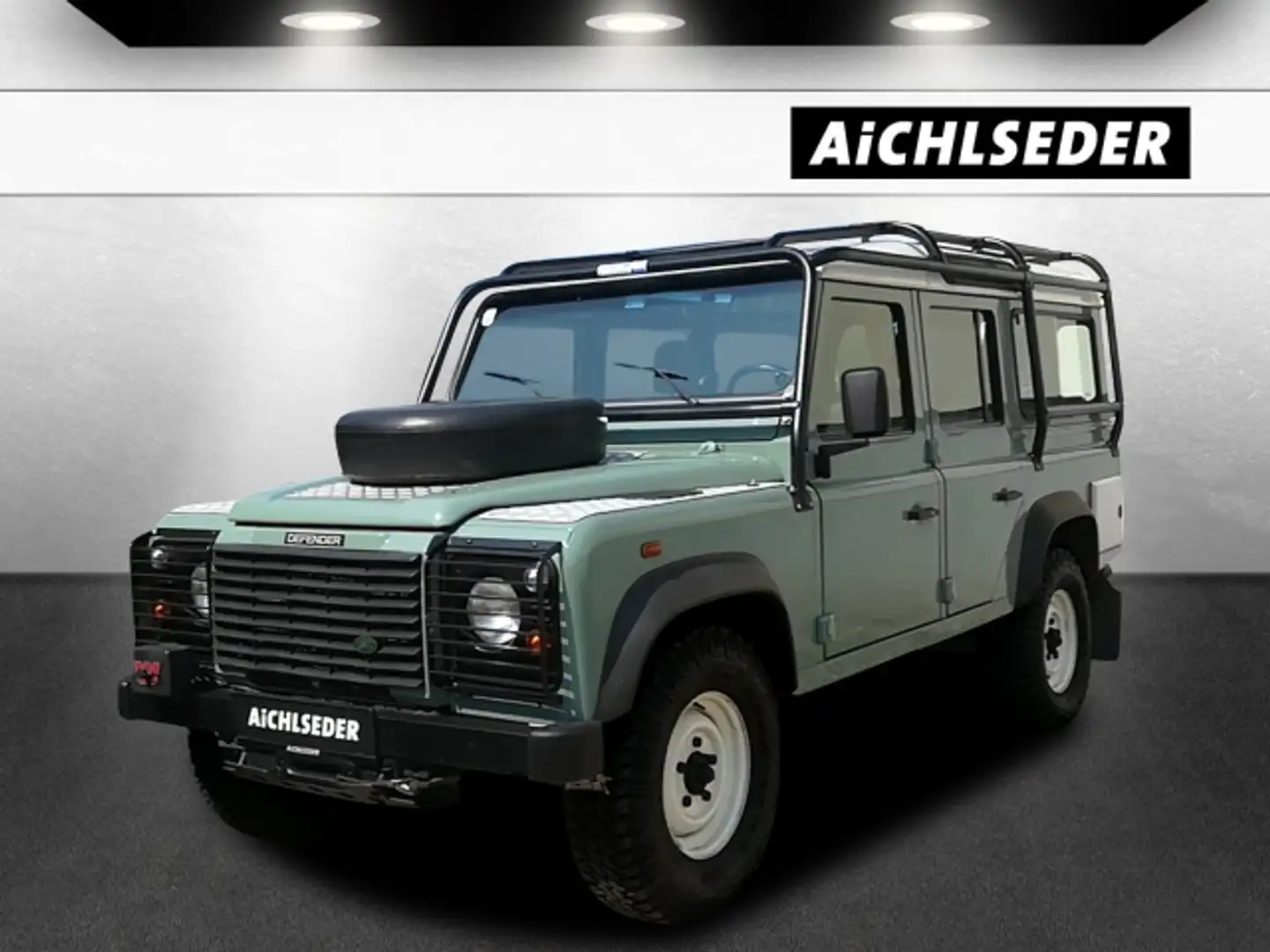Land Rover Defender 110 SW 2,5TD 9-Sitzer/Klima Grün - 1