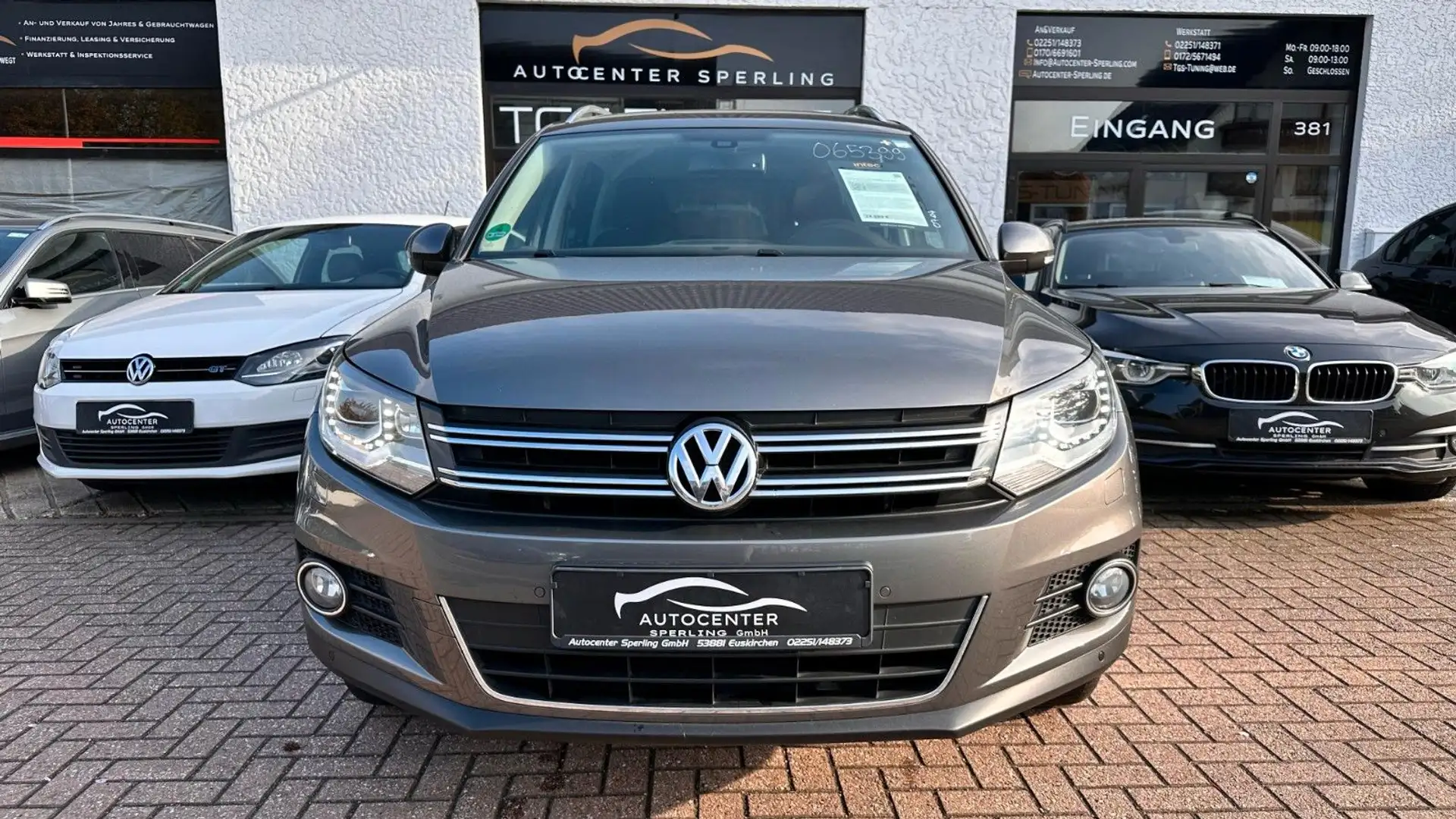 Volkswagen Tiguan 1.4 TSI Sport & Style BMT*Navi*BI-Xenon* Grijs - 2