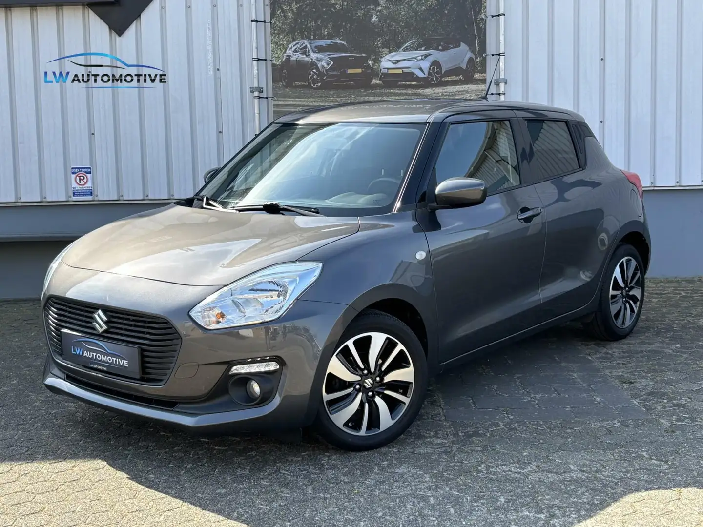 Suzuki Swift 1.2 Smart Hybrid Select | Navi | Camera | 16 inch| Gris - 1