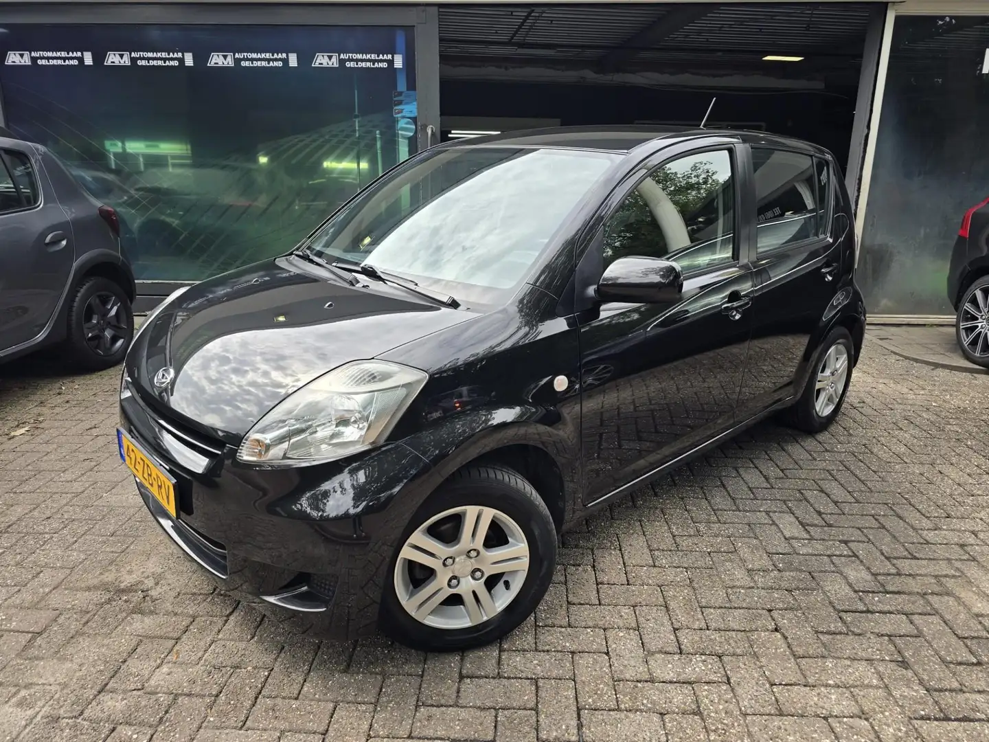 Daihatsu Sirion 2 1.0-12V Premium | 1E EIGENAAR |3/6 OF 12MND GARA Schwarz - 1