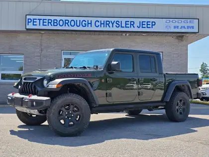 Green 2023 Jeep Gladiator Pickup Truck Four-Wheel Drive Manual