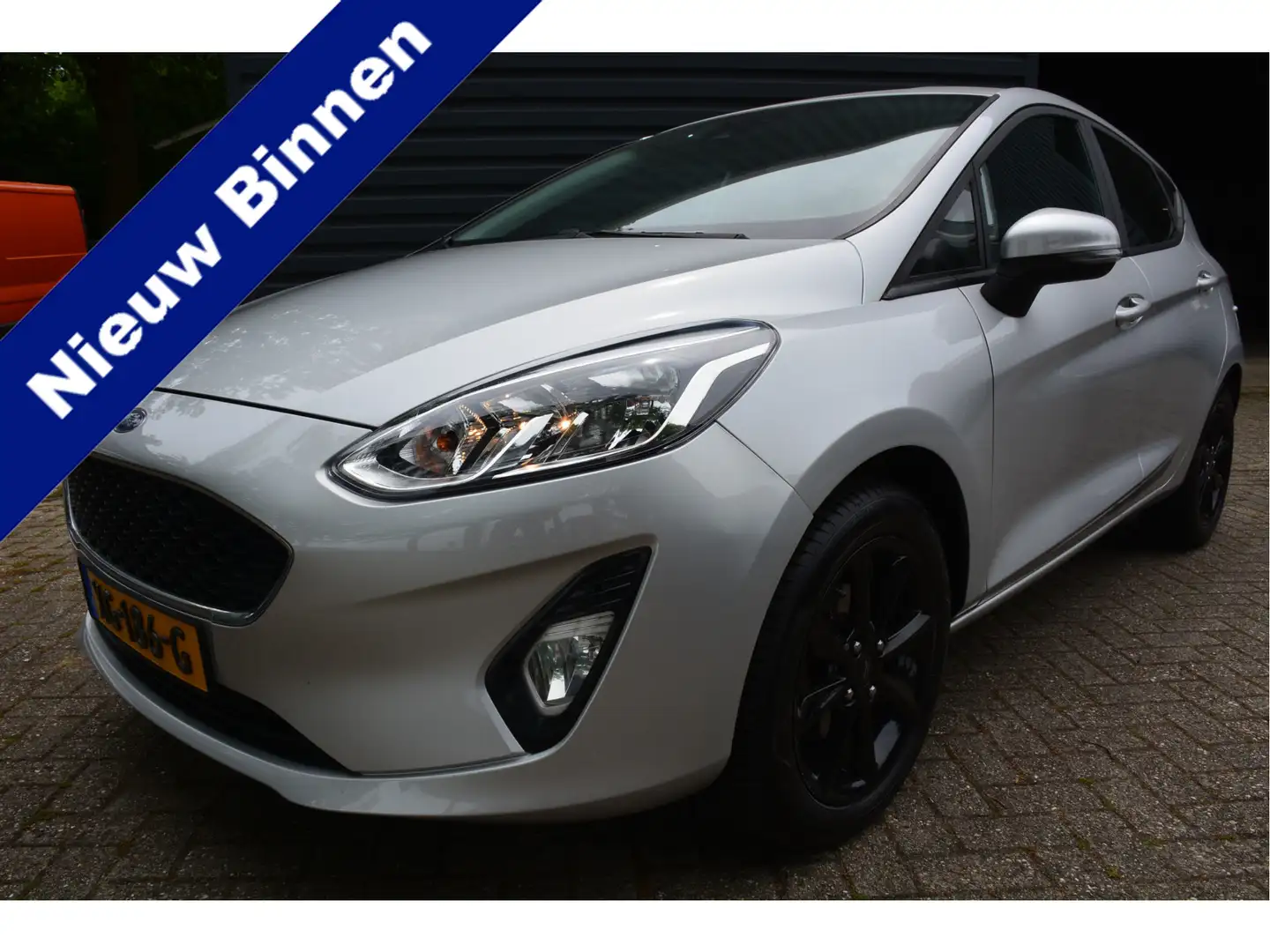 Ford Fiesta 1.1 Trend PDC Airco Clima Navi Bovag Carplay Cruis Grijs - 1