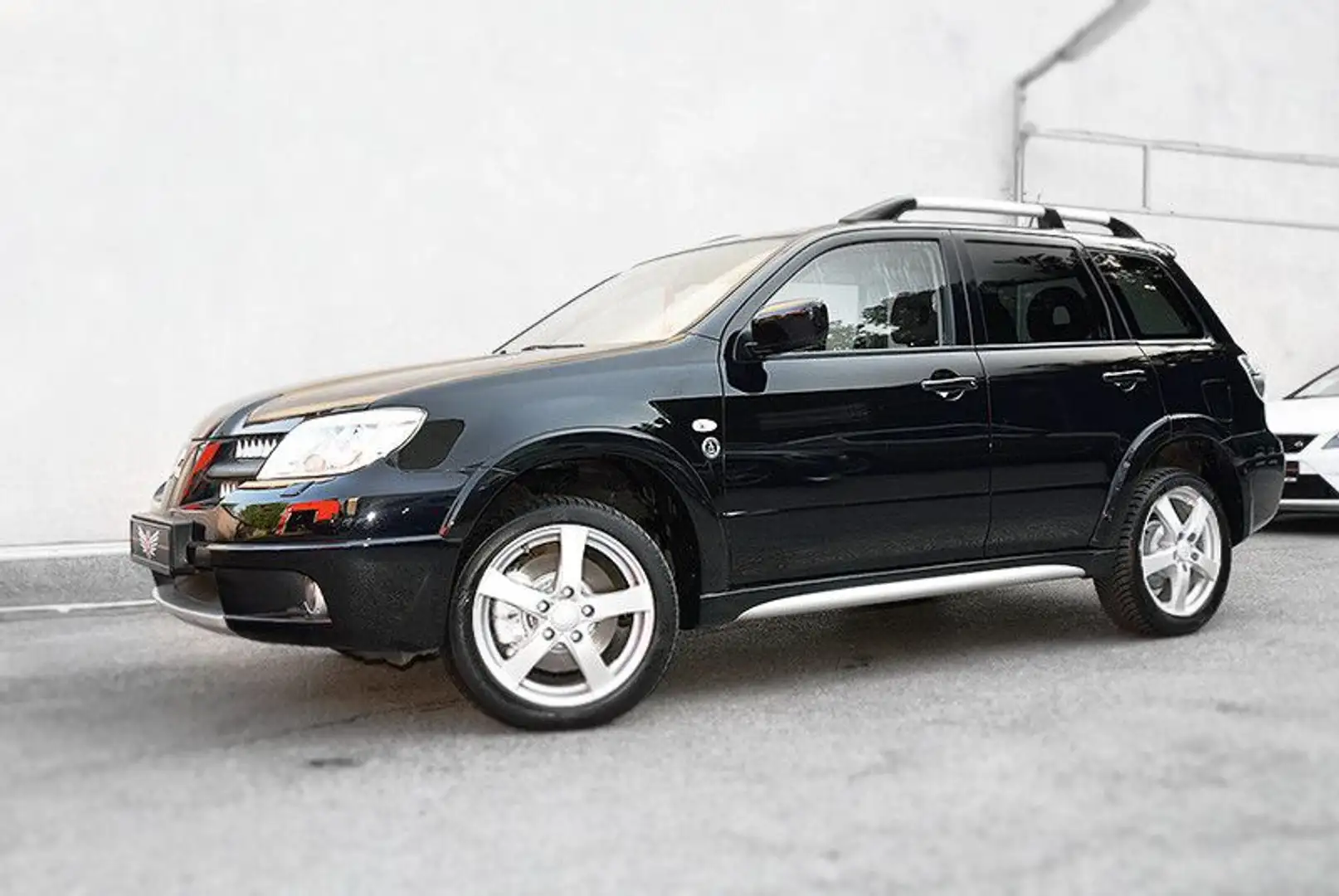 Mitsubishi Outlander OUTLANDER 2.4 DACAR *Klimaautom.*R-Cam*AHK*Alu* Schwarz - 2