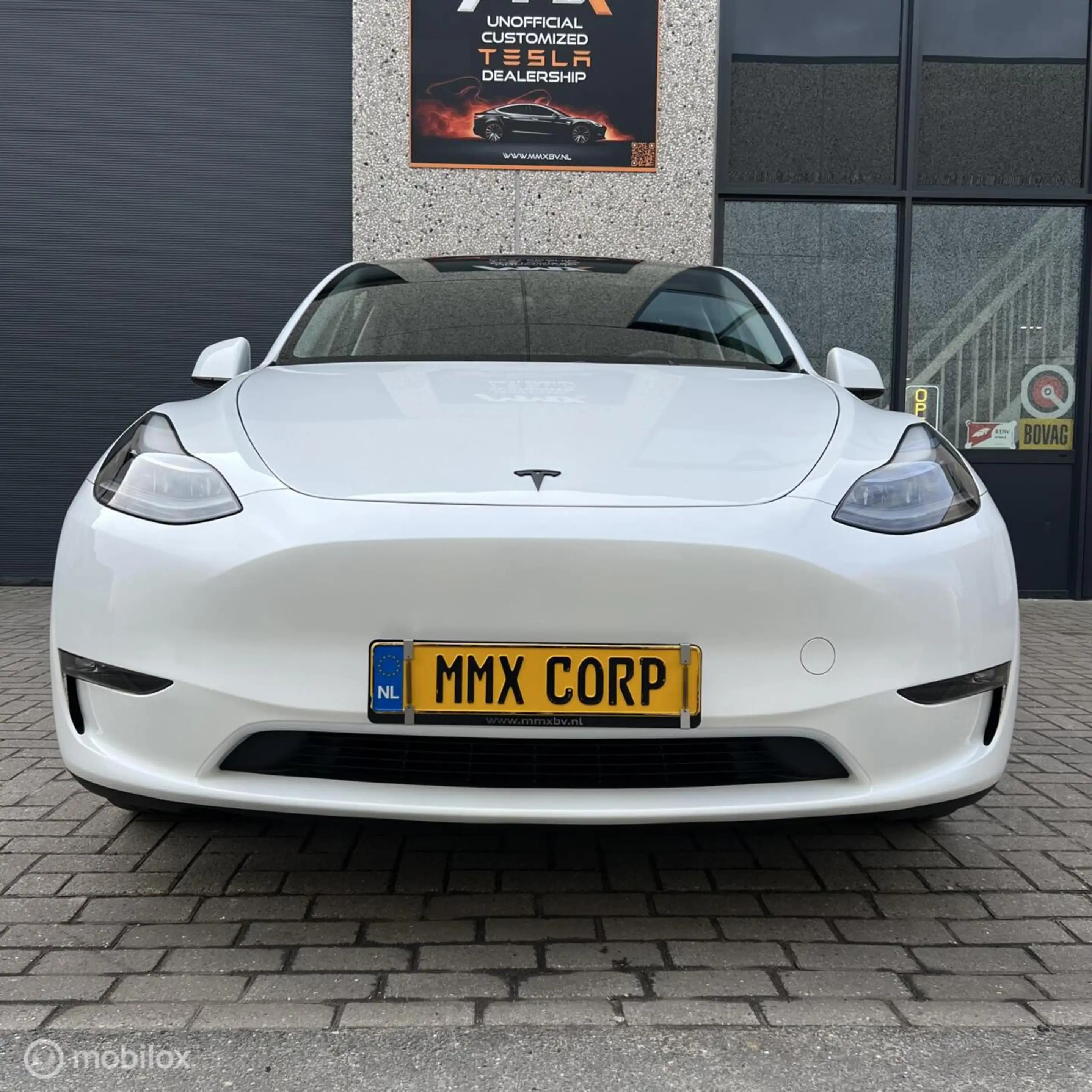 Tesla Model Y Performance + MMX PACK + EAP + TREKHAAK — photo 4