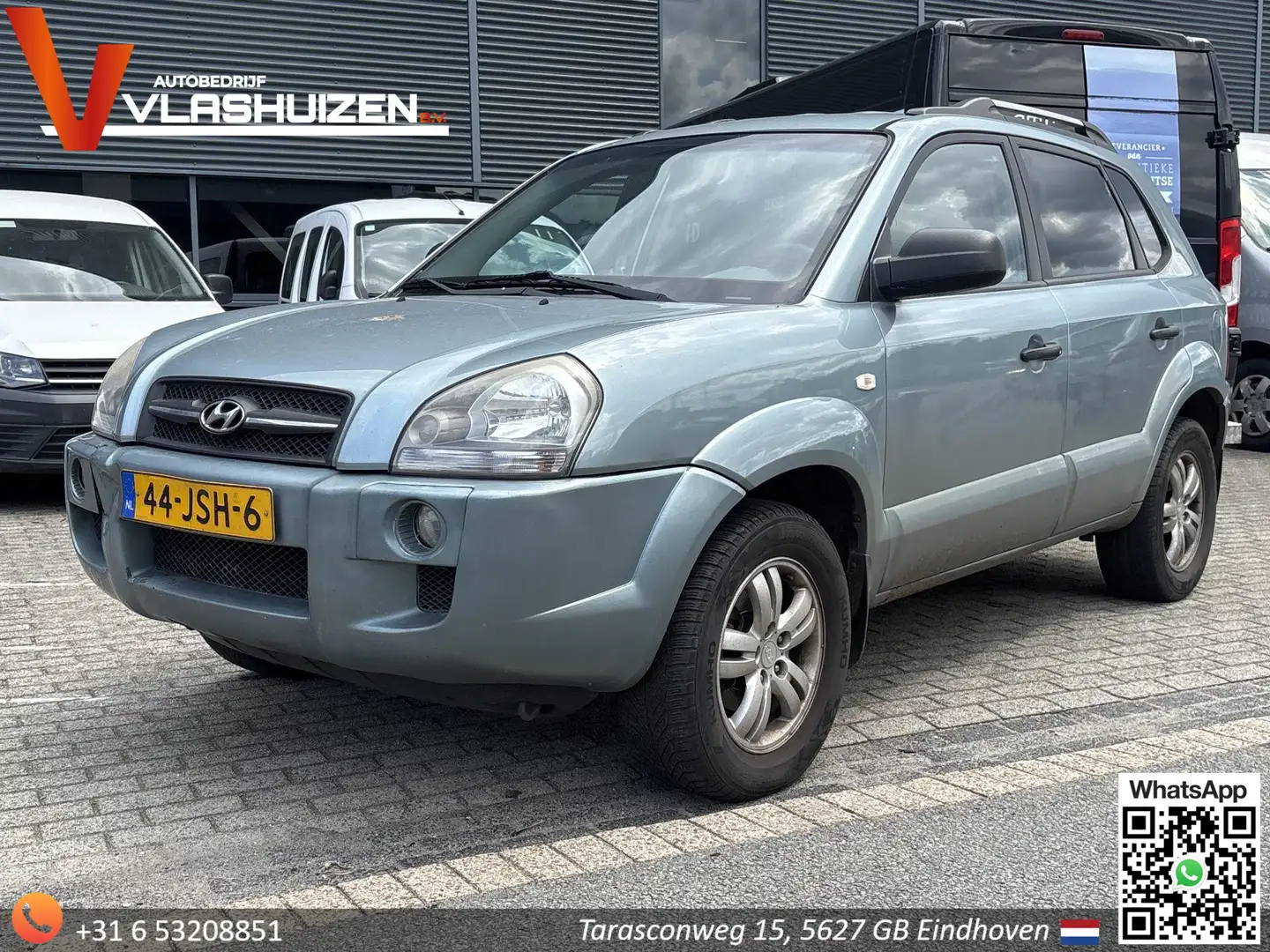 Hyundai TUCSON 2.0i Dynamic Executive | Airco | Trekhaak | Gris - 1