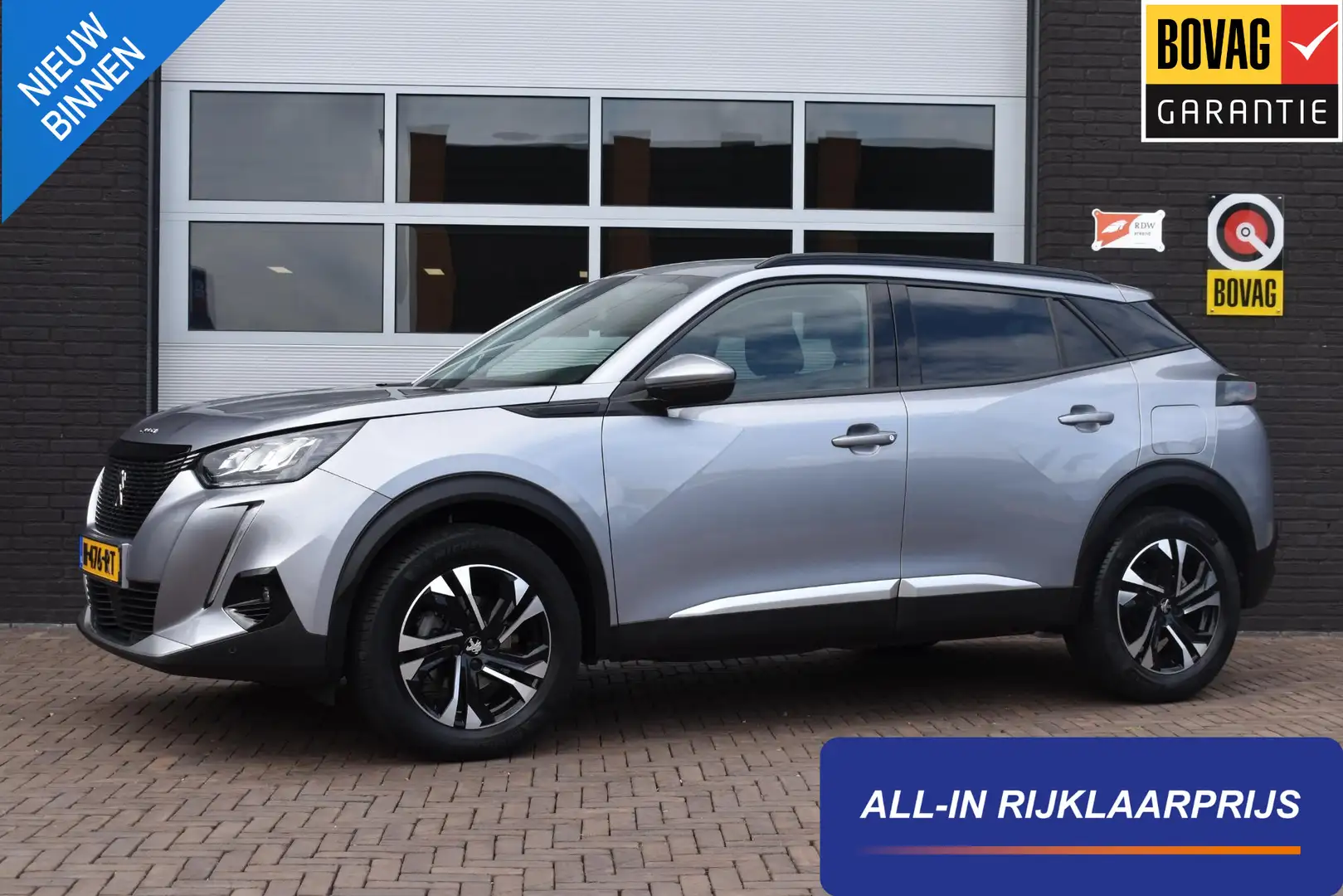Peugeot 2008 1.2 130PK PureTech Allure Pack | Camera | Navi | I Grijs - 1