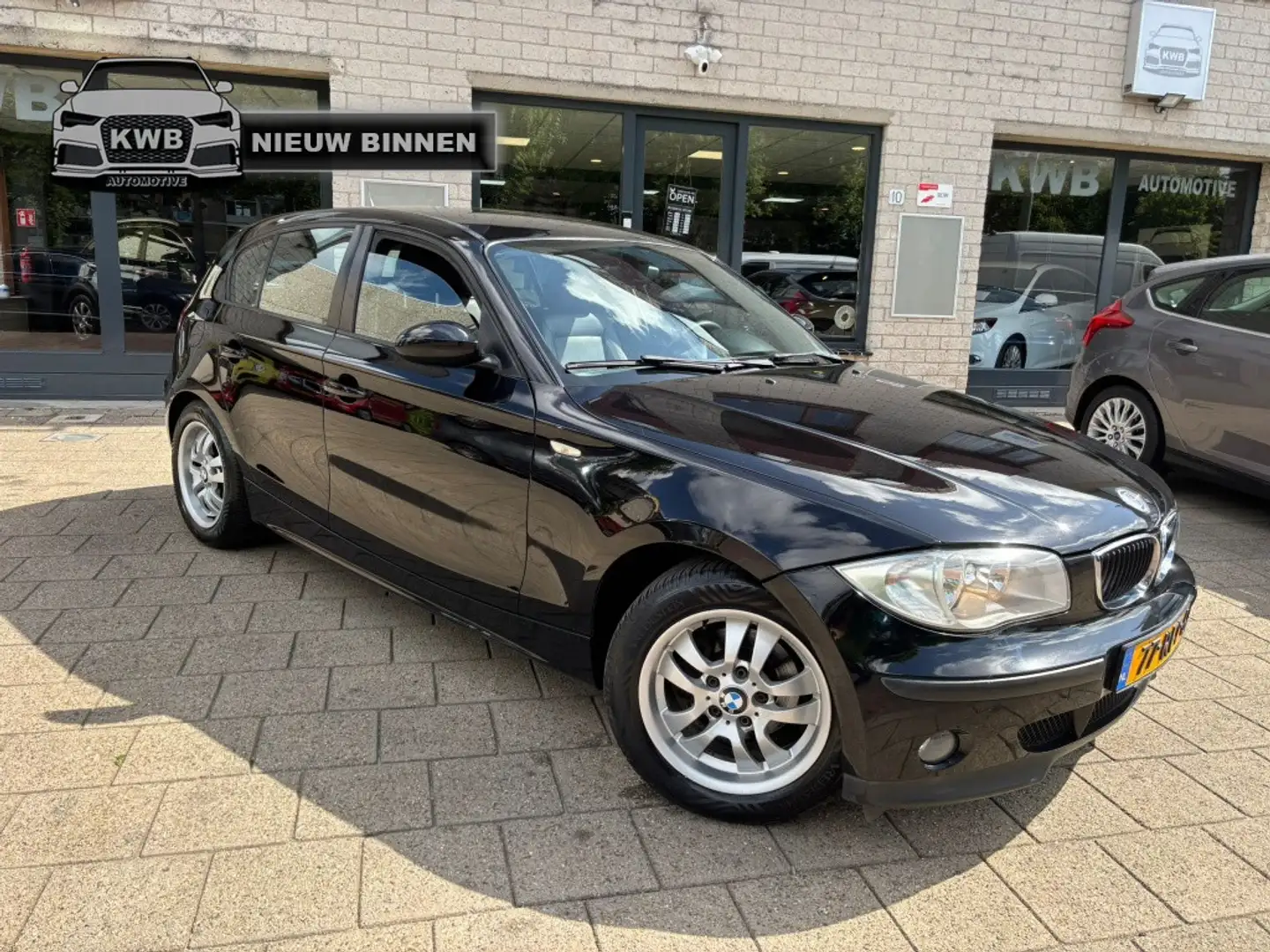 BMW 116 1-serie 116i Business Line 5Drs Airco Leer Zwart - 1