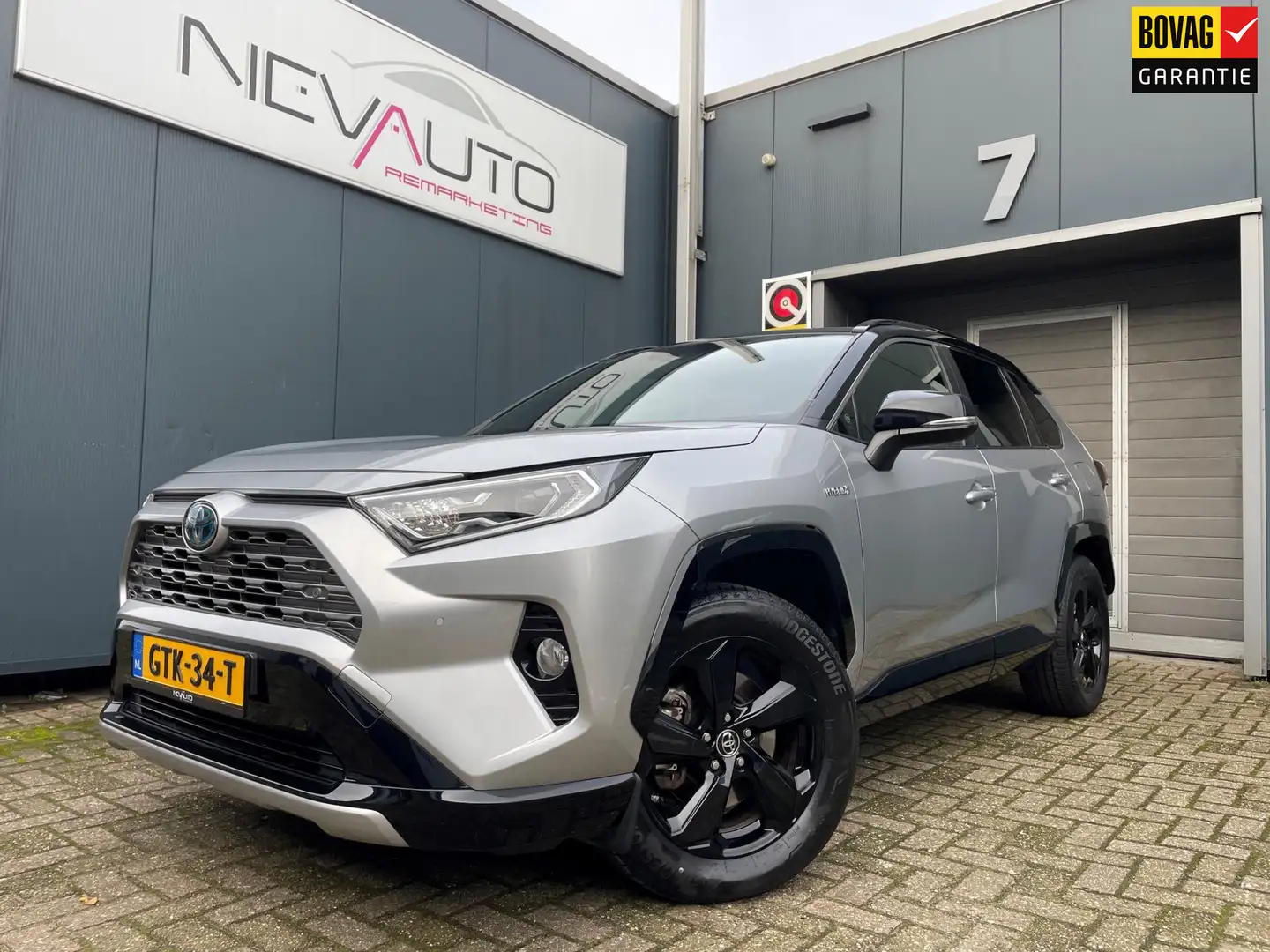 Toyota RAV 4 2.5 Hybrid Bi-Tone 219PK STOELVERWARMING APPLE CAR Grijs - 1