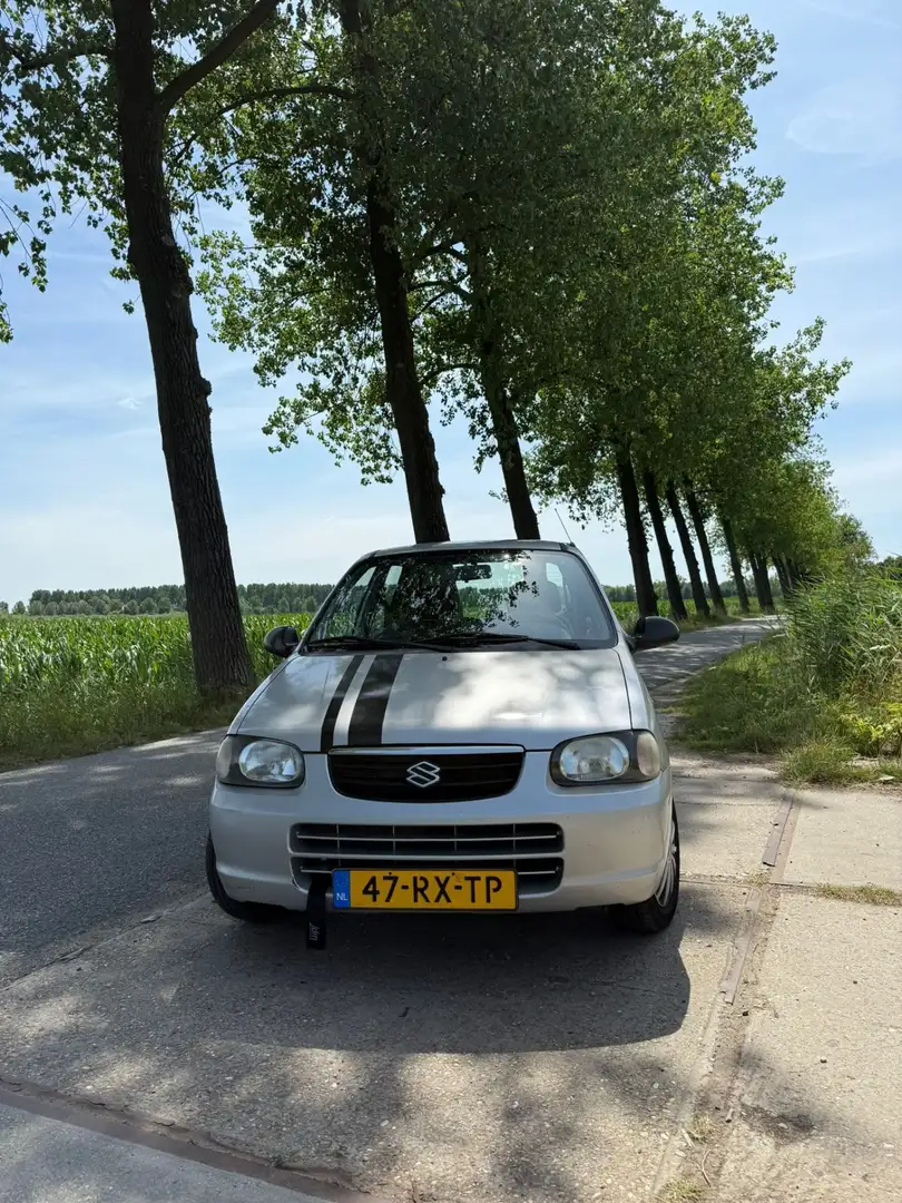 Suzuki Alto 1.1 GLX Spirit Automaat Серебристый - 1
