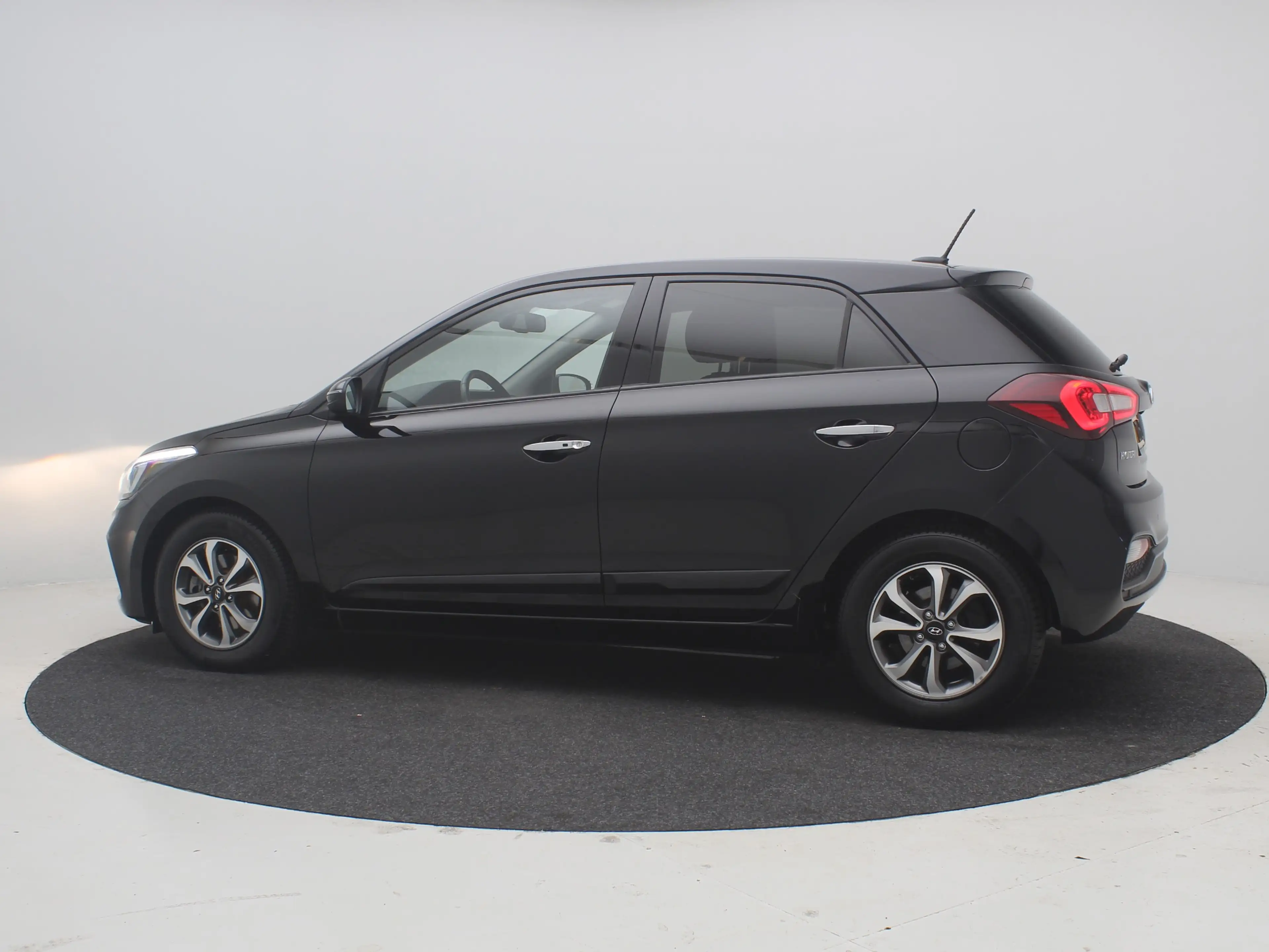 Hyundai i20 1.0 T-GDI Premium | Achterbank in delen neerklapba — photo 10