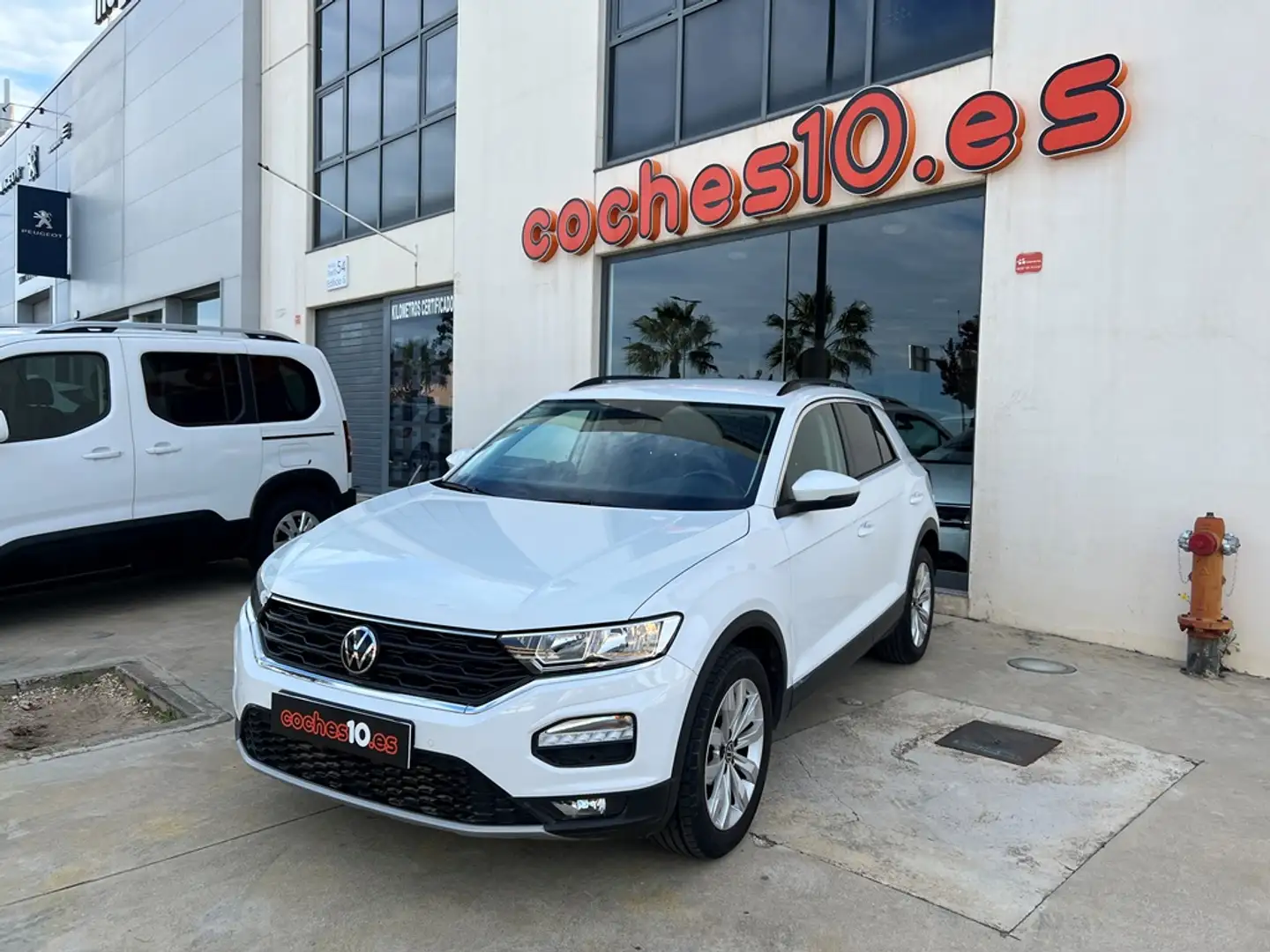 Volkswagen T-Roc 1.0 TSI Advance Style Wit - 1