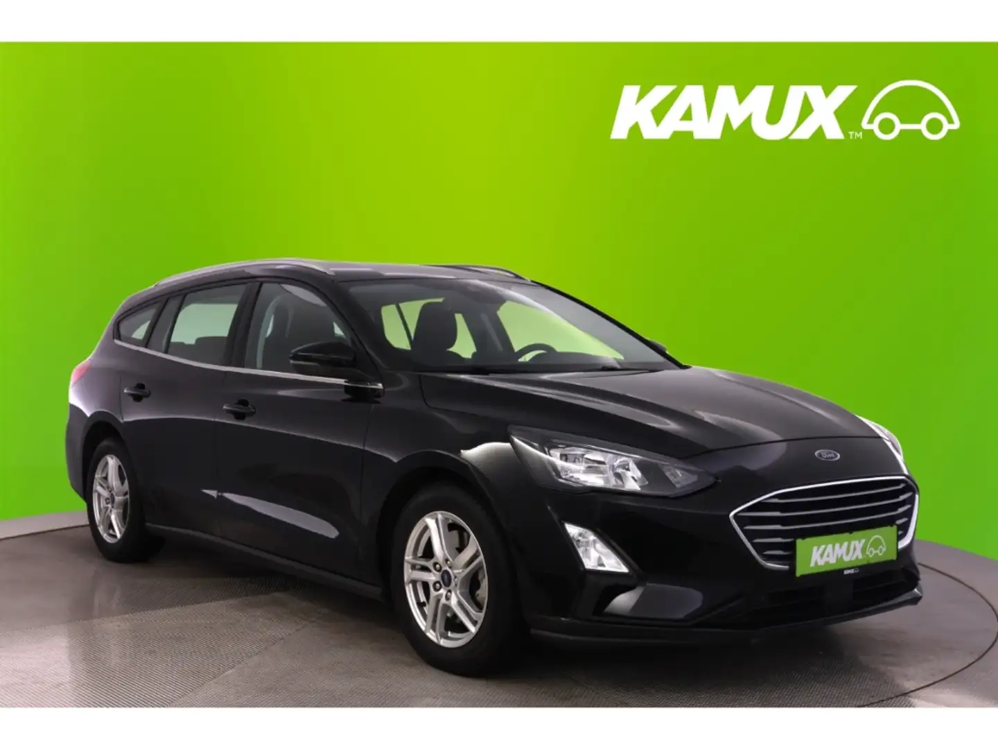Ford Focus 1.0EB Turnier Aut.+LED+NAVI+KAMERA+PDC Zwart - 1