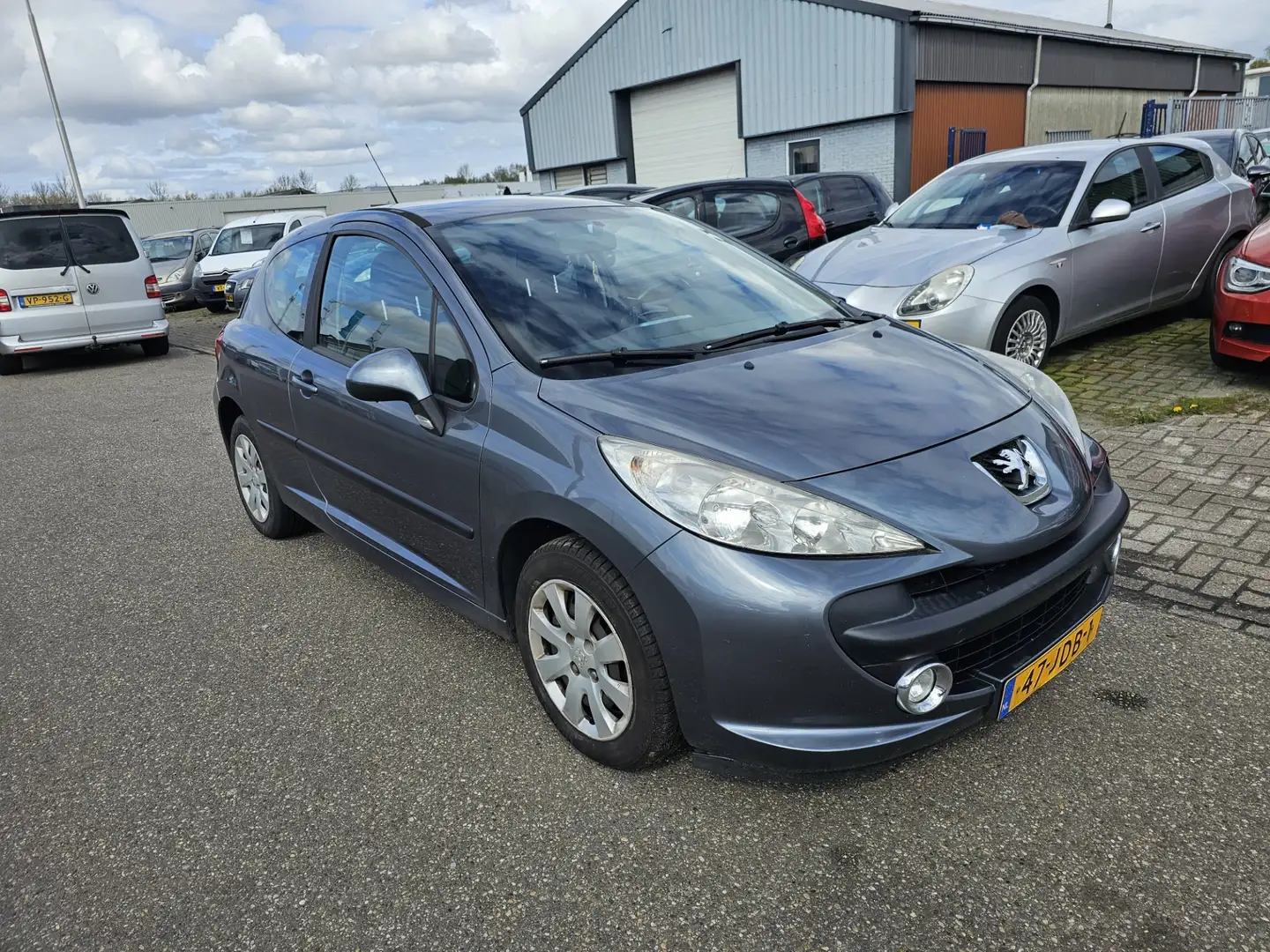 Peugeot 207 1.4 VTi Look Airco Bj:2009 NAP! Grijs - 2