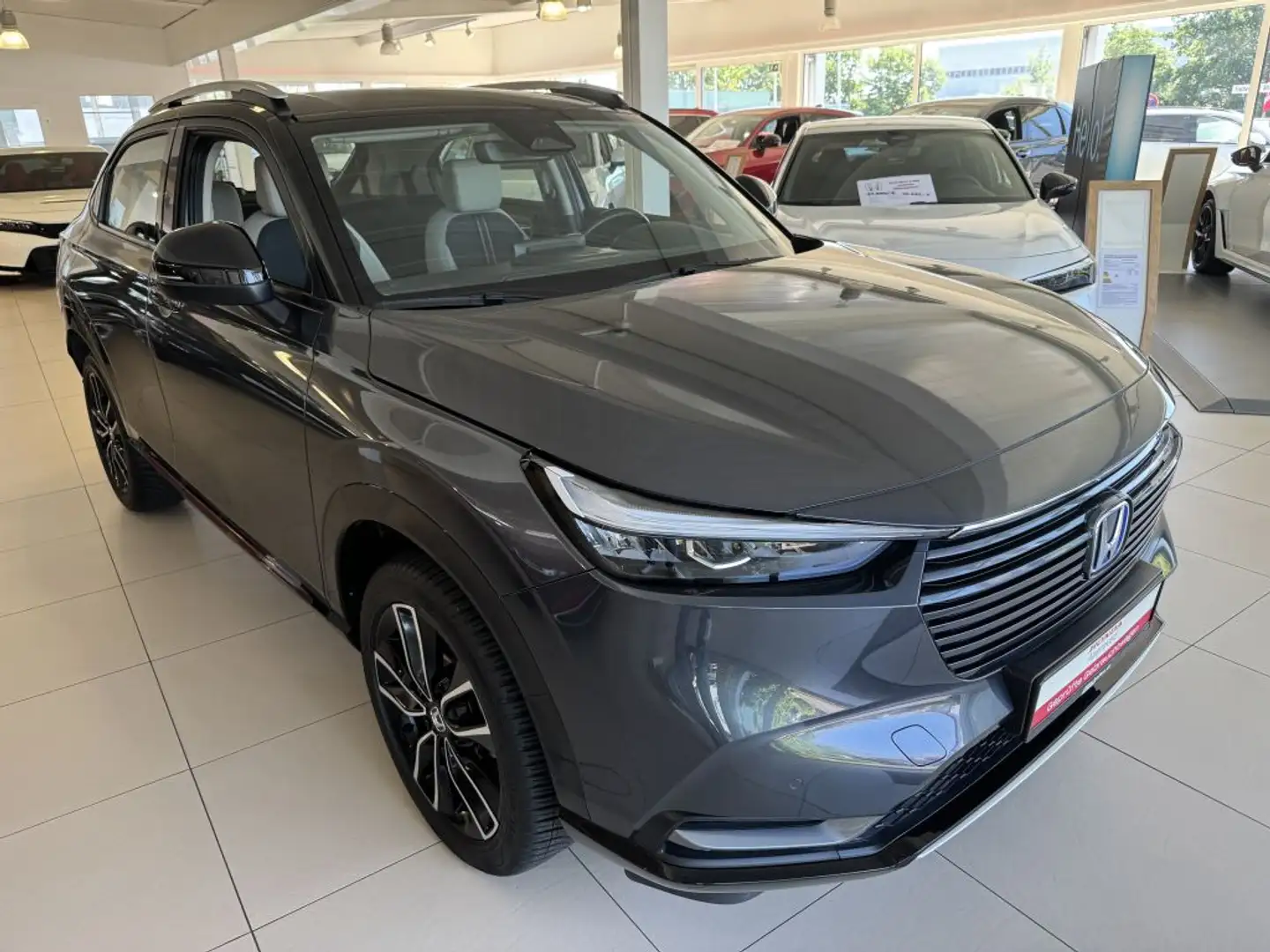 Honda HR-V e:HEV 1.5 i-MMD Hybrid Advance Style Grau - 1