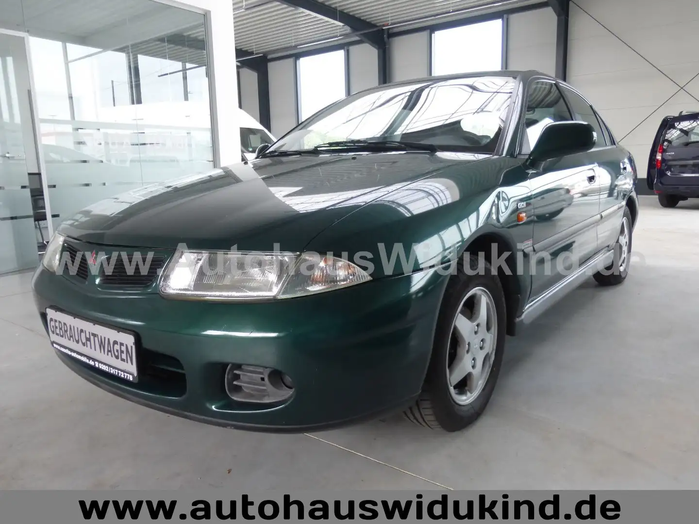 Mitsubishi Carisma 1.8 GDI Klimaaut. nur 117tkm 2.HAND TÜV Verde - 1