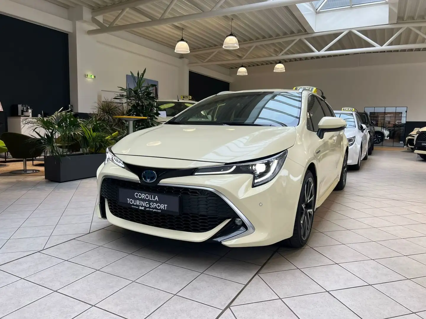 Toyota Corolla TS 2,0l Hybrid, Lounge Lounge Taxi Silber - 1