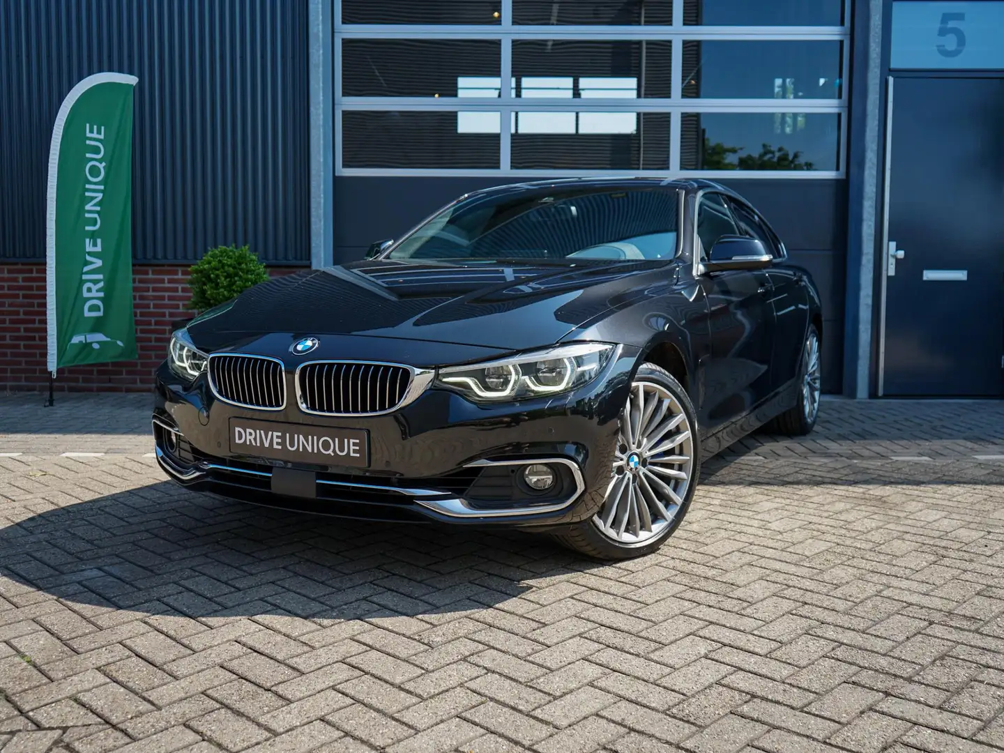BMW 440 4-serie Gran Coupé 440i xDrive High Executive | Ad Zwart - 1