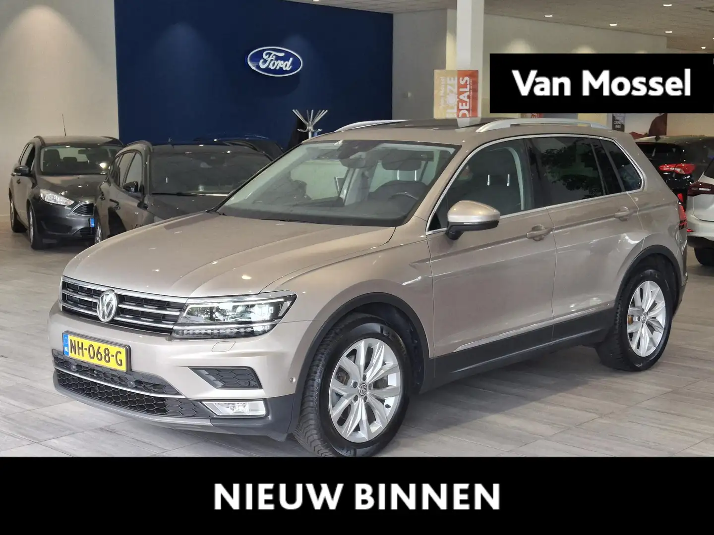 Volkswagen Tiguan 1.4 TSI ACT Highline Trekhaak | ACC | Stoelverwarm Jaune - 1