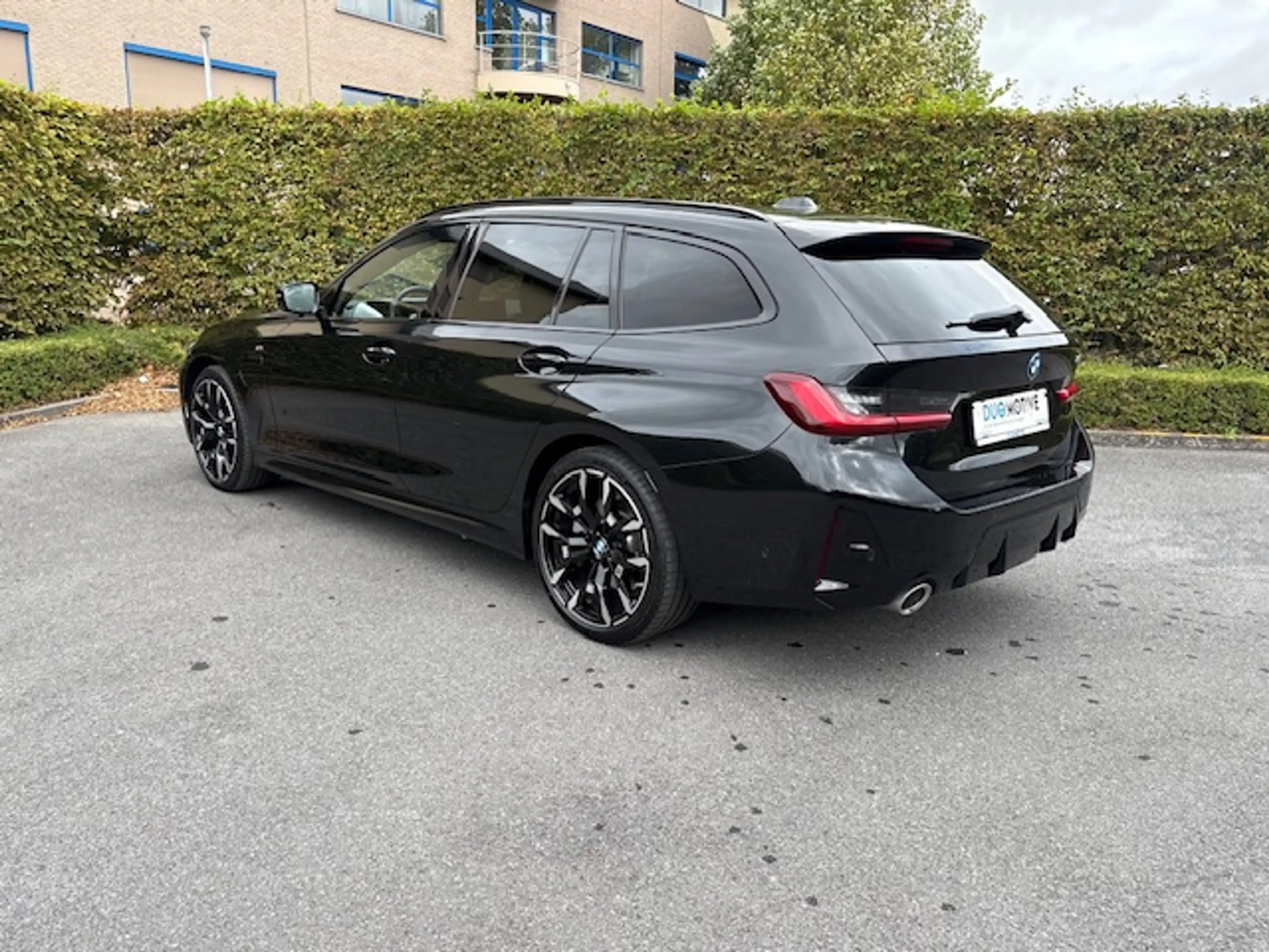 BMW 330 Touring 330eAS PHEV (215 kW) — photo 11