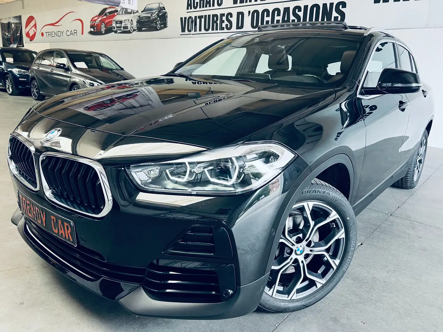BMW X2 1.5iA sDrive18 EU6d+NAVI+PANO+HUD+CARNET+GARANTIE Zwart - 1