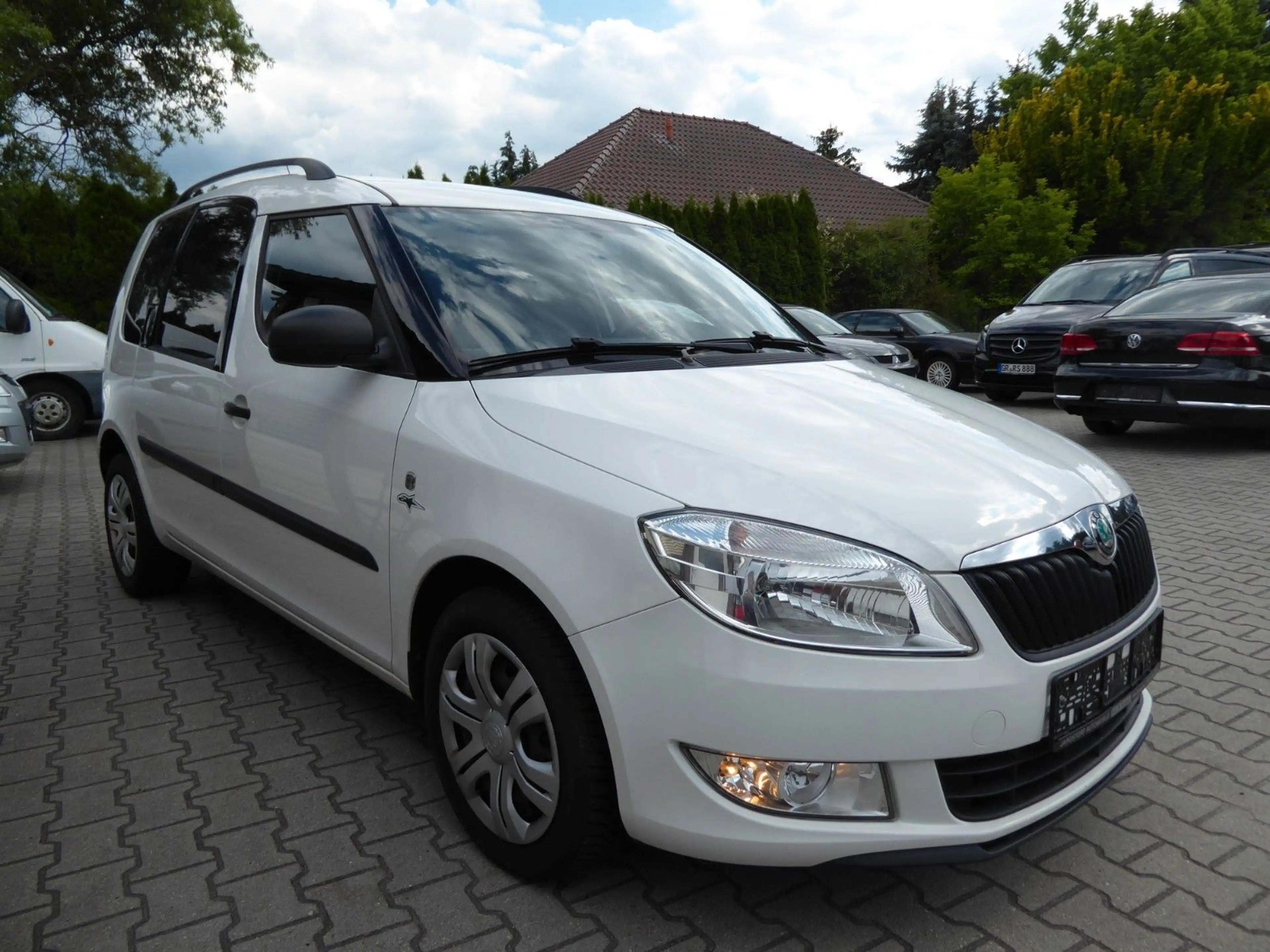 Skoda Roomster Praktik TDi Klima/Winterräder/Tempomat — photo 2