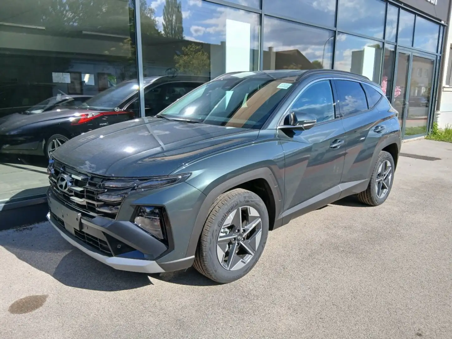 Hyundai TUCSON NX4 GO Plus 1,6 T-GDi HEV 2WD AT t6hu1 Grün - 1