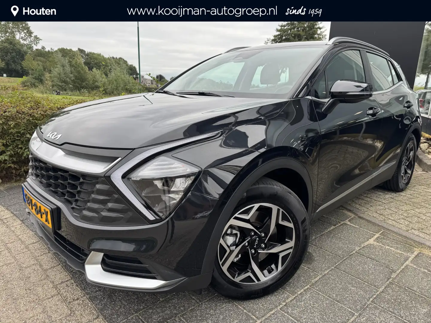 Kia Sportage 1.6 T-GDi MHEV ComfortLine | Trekhaak | Eerste Eig Zwart - 1